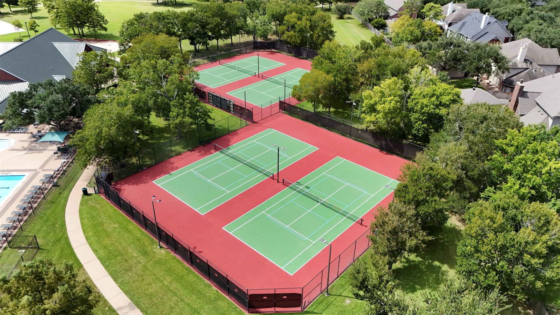 1414 Forest Bend, Sugar Land, TX 77479 Aerial view of the neighborhood tennis courts.