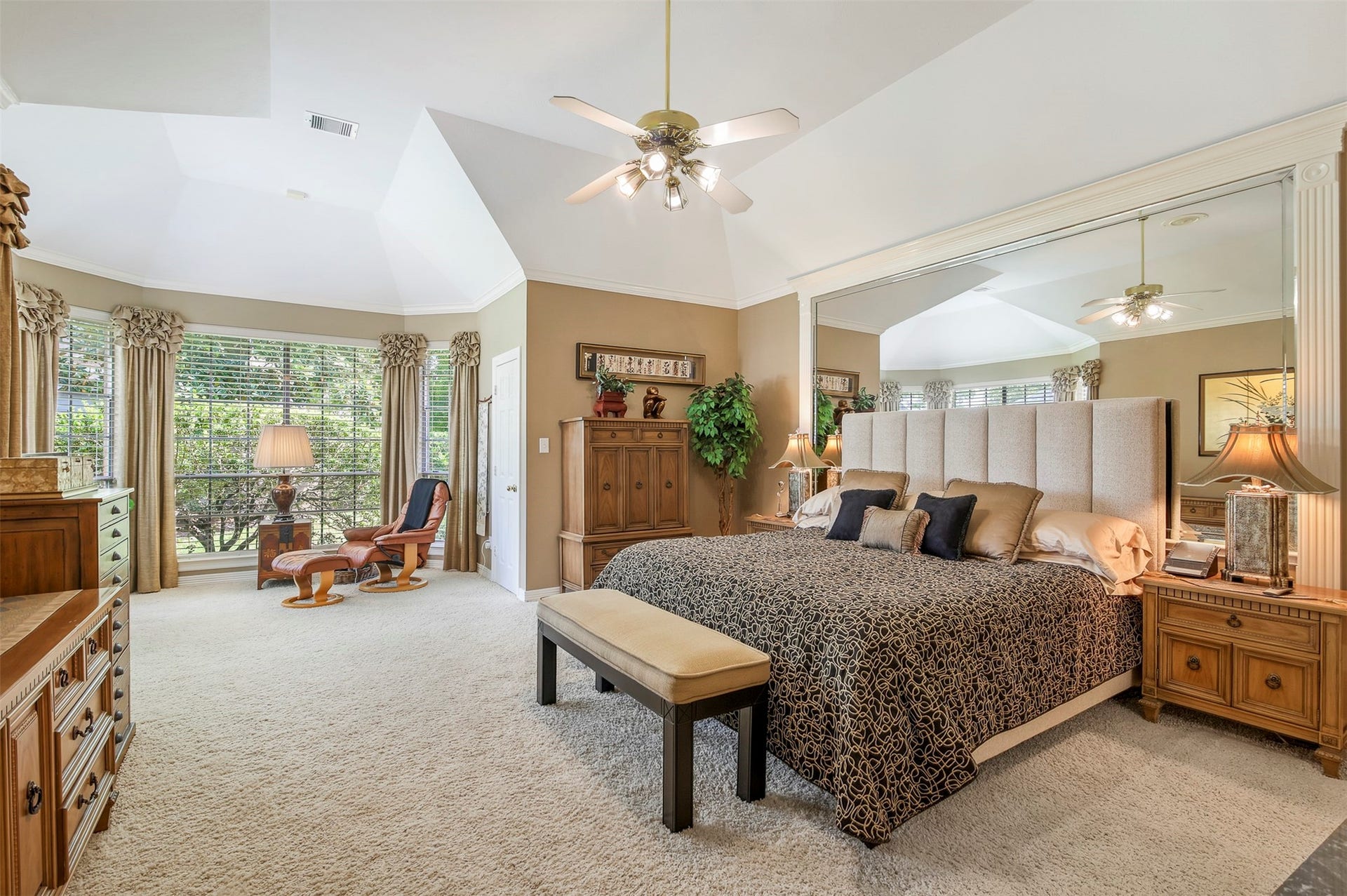 1414 Forest Bend, Sugar Land, TX 77479 The primary bedroom is your own private retreat with separate sitting room area, elevated ceilings, fan and plush carpet.