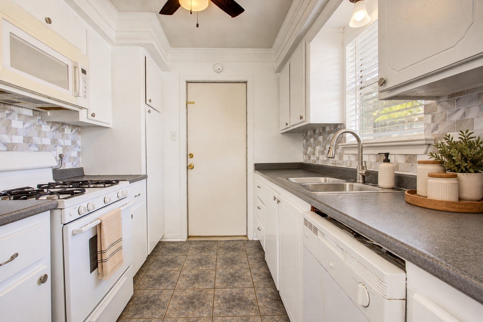 15127 Mcconn Street, Houston, TX 77598 As you go past the dining room, you enter the lovely and bright kitchen