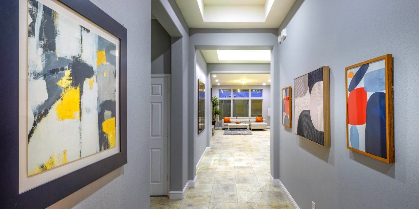 4523 Matagorda Lakes Drive, Humble, TX 77396 Custom designed and painted large gallery hallway... custom tile throughout the home. Breathtaking.
