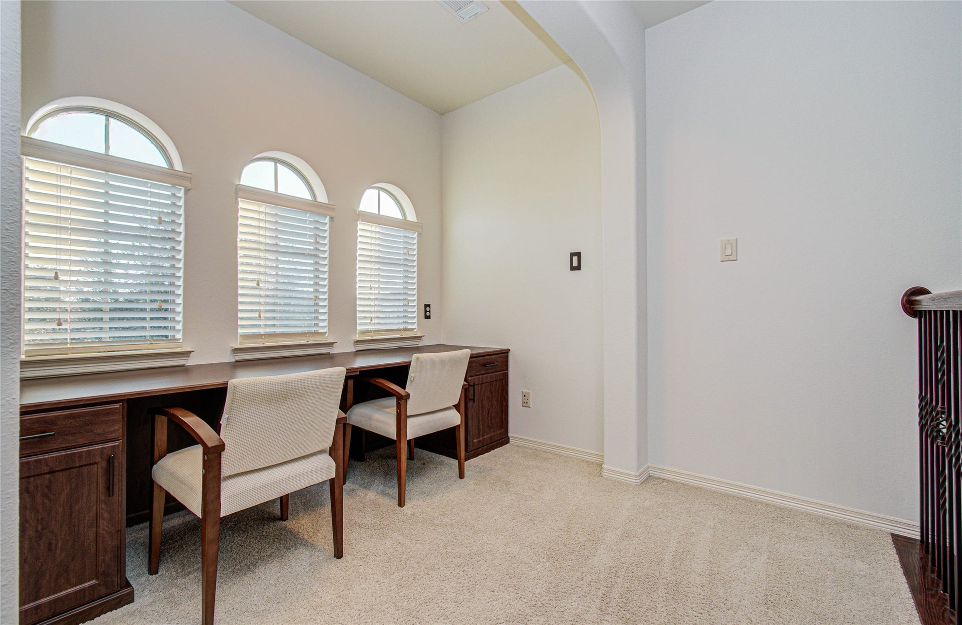 Bright and inviting office loft with ample natural light, perfect for productivity and focus.
