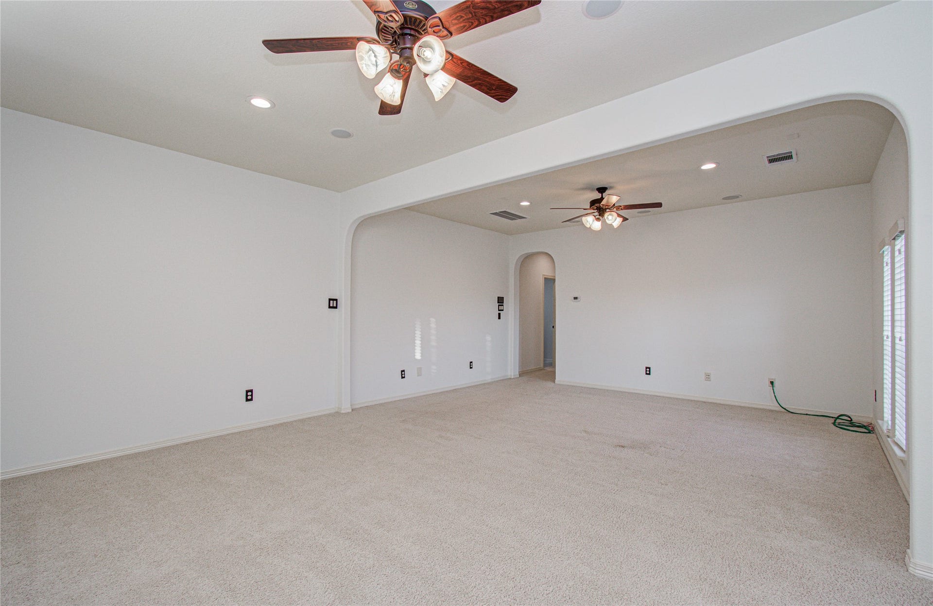 Create your perfect game room in this bright, inviting space ideal for entertainment and relaxation.