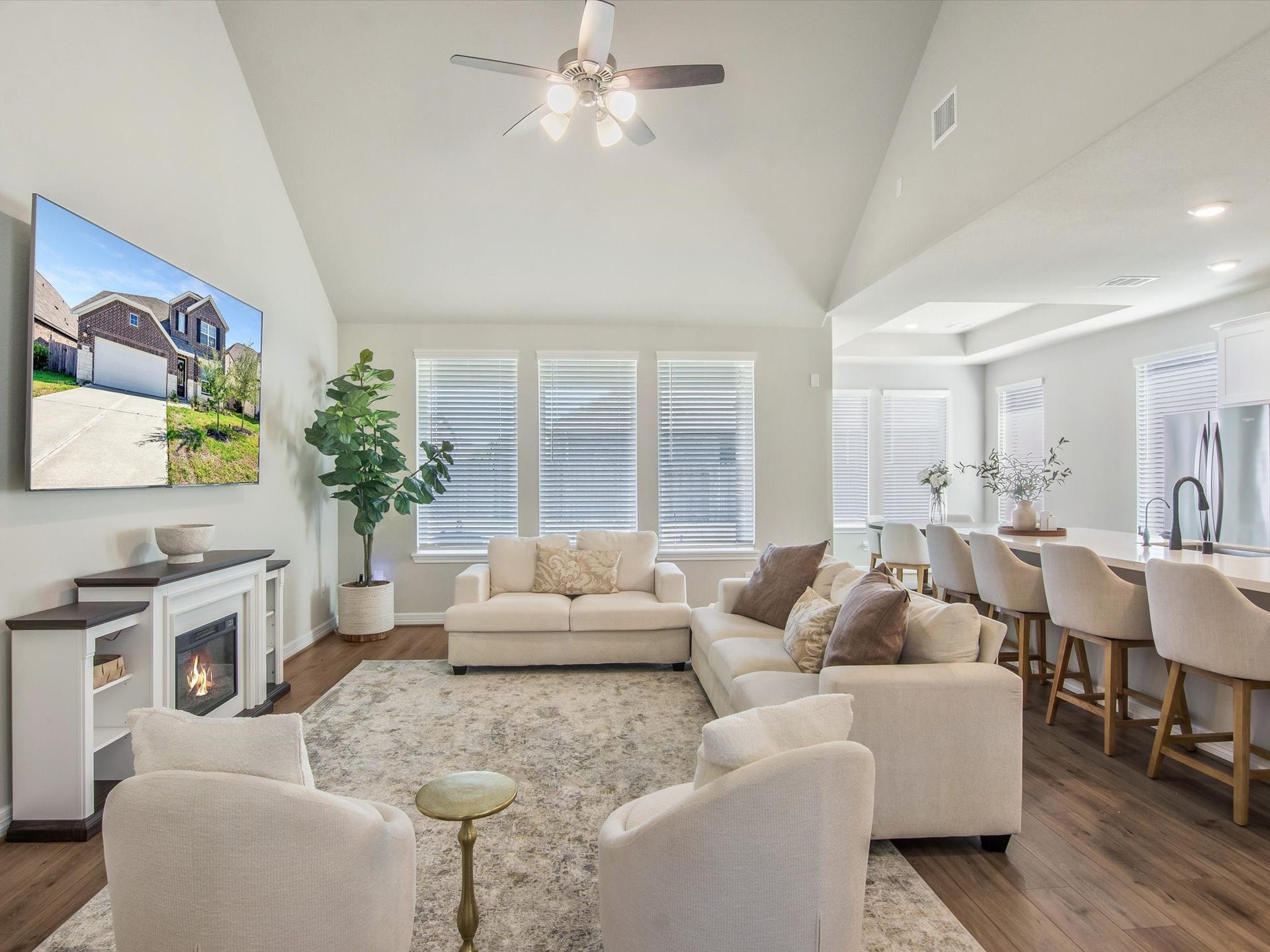 Vaulted ceilings and a wall of windows in the living room