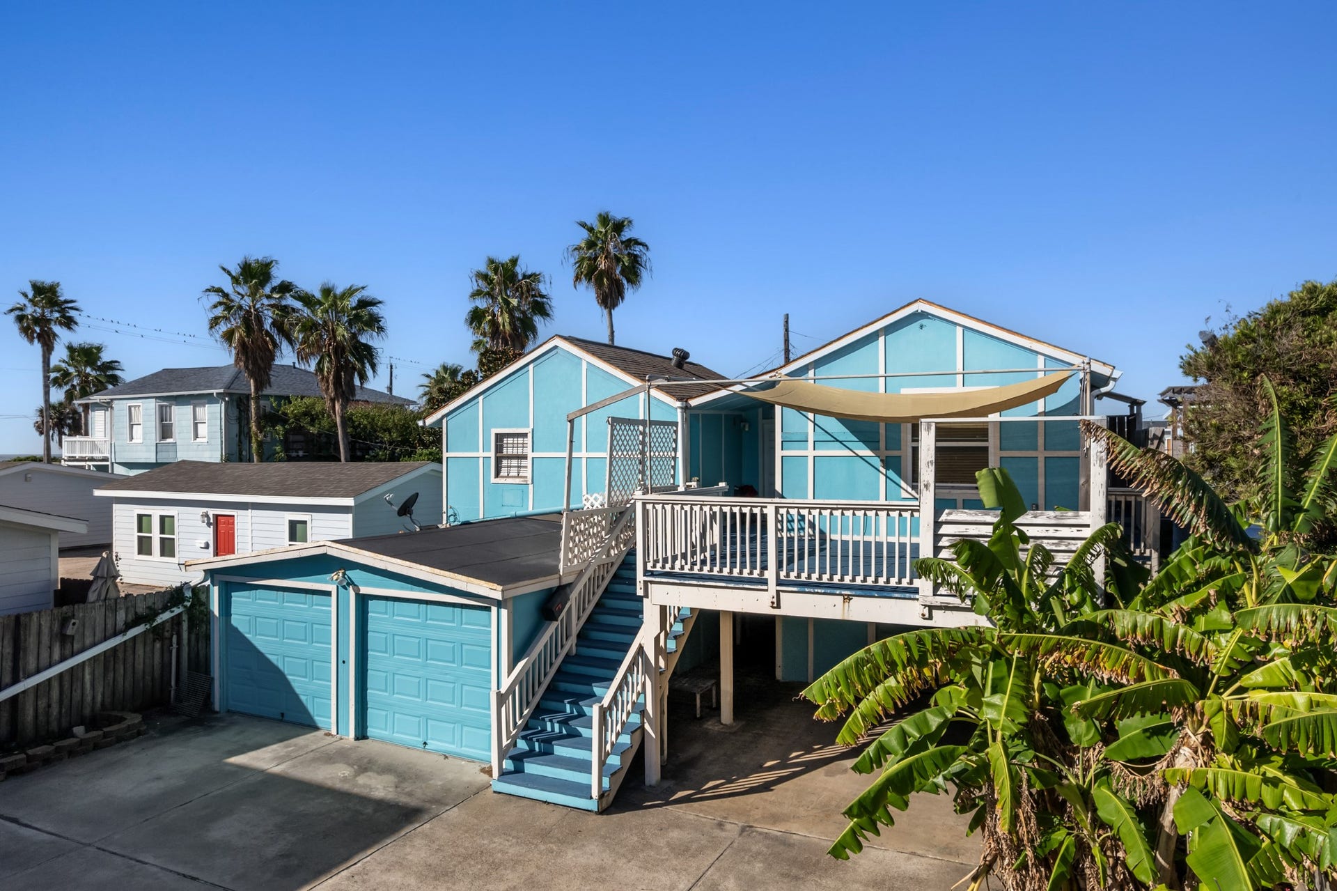 2815 Jack Johnson Boulevard, Galveston, TX 77550 Two garages and garage apartment