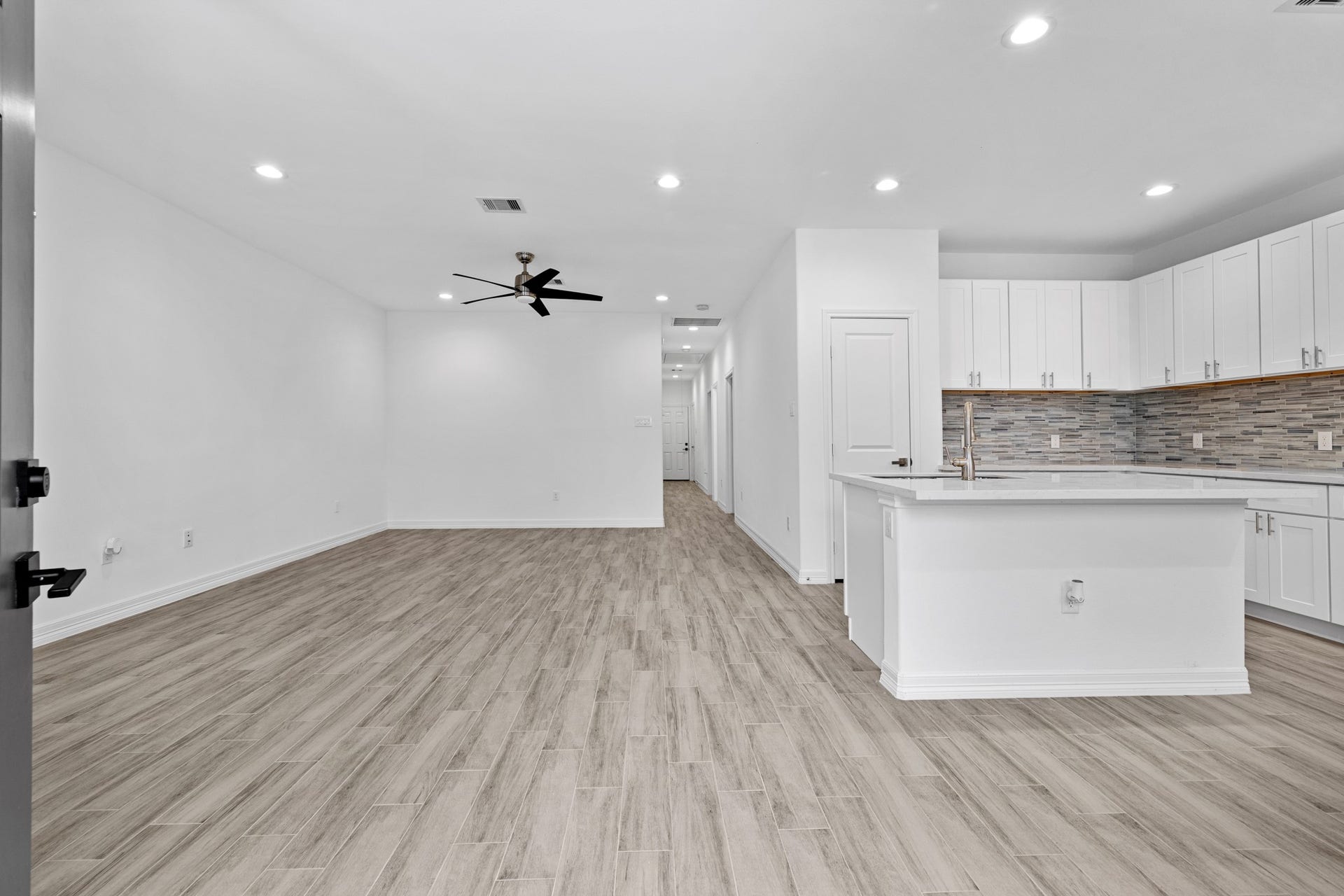 Upon entry you are greeted by the breathtaking expansive living and dining room.
