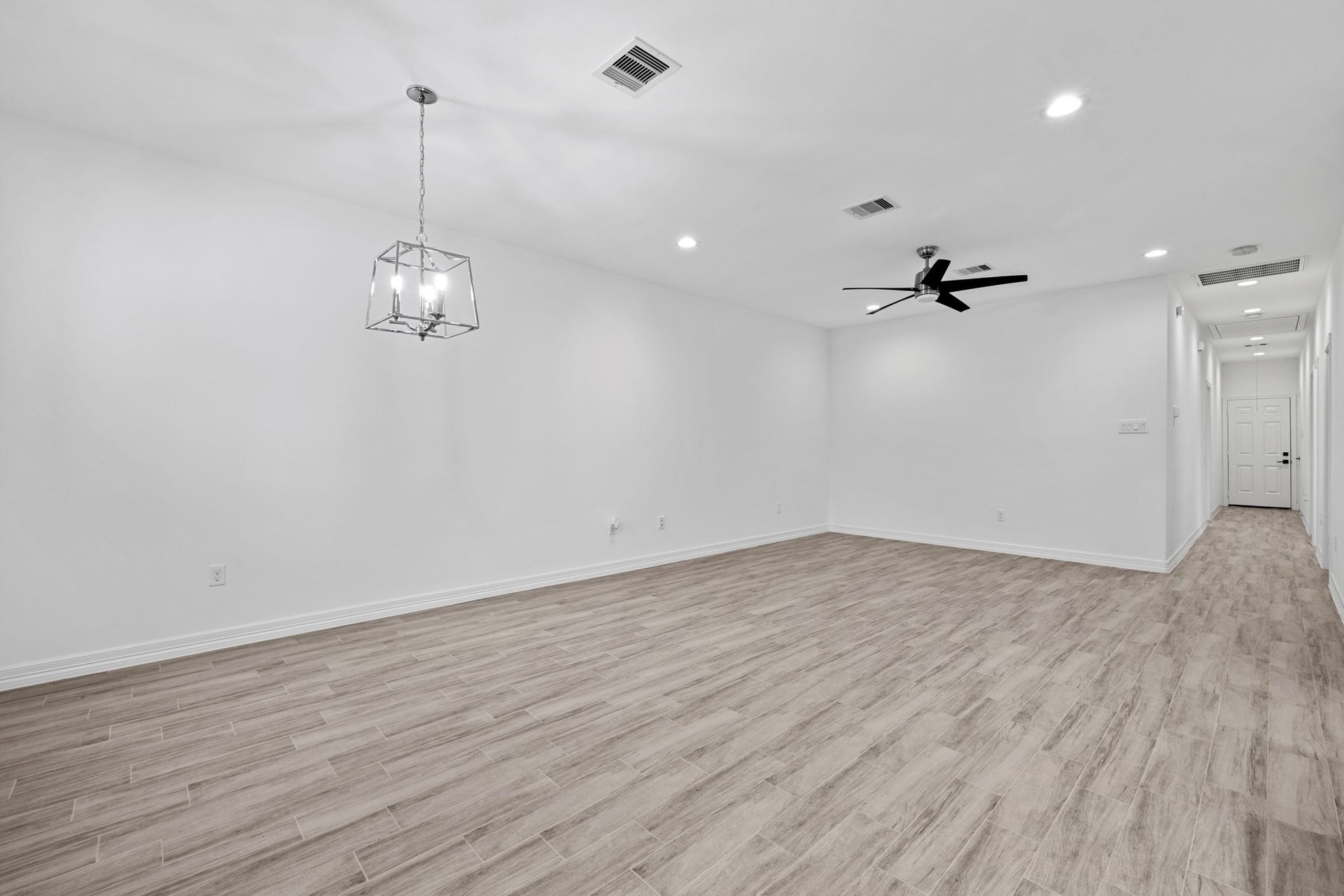 This new home is complete with luxury flooring throughout, light bright walls that capture the natural light coming through the gorgeous windows, and trendy lighting fixtures in every room.