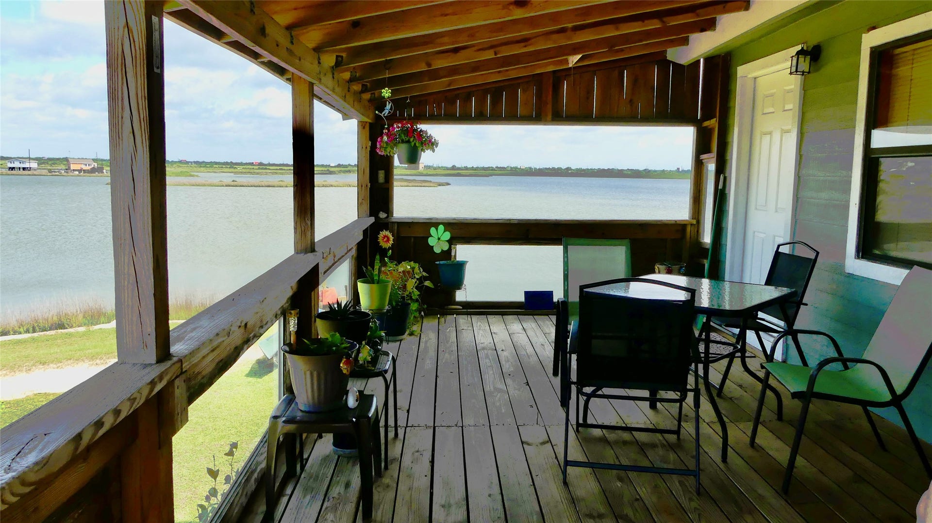 4432 Swan Street, Hitchcock, TX 77563 Covered deck to enjoy the waterfront views