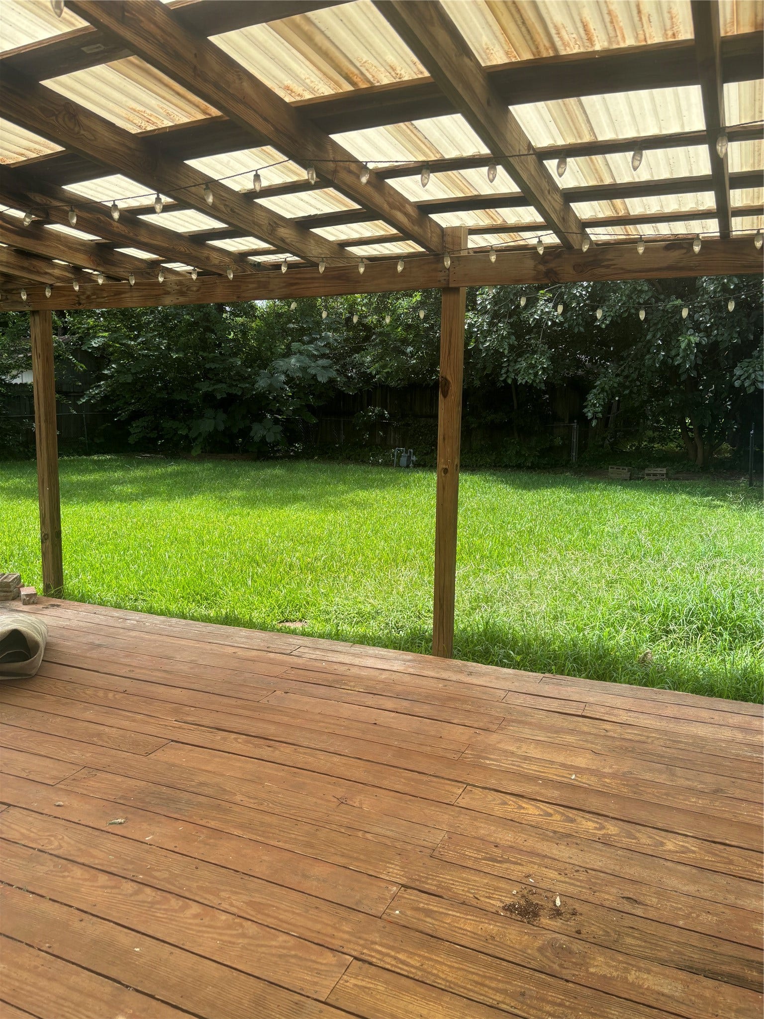 4713 Saxon Street, Bellaire, TX 77401 Covered patio/deck overlooking large backyard