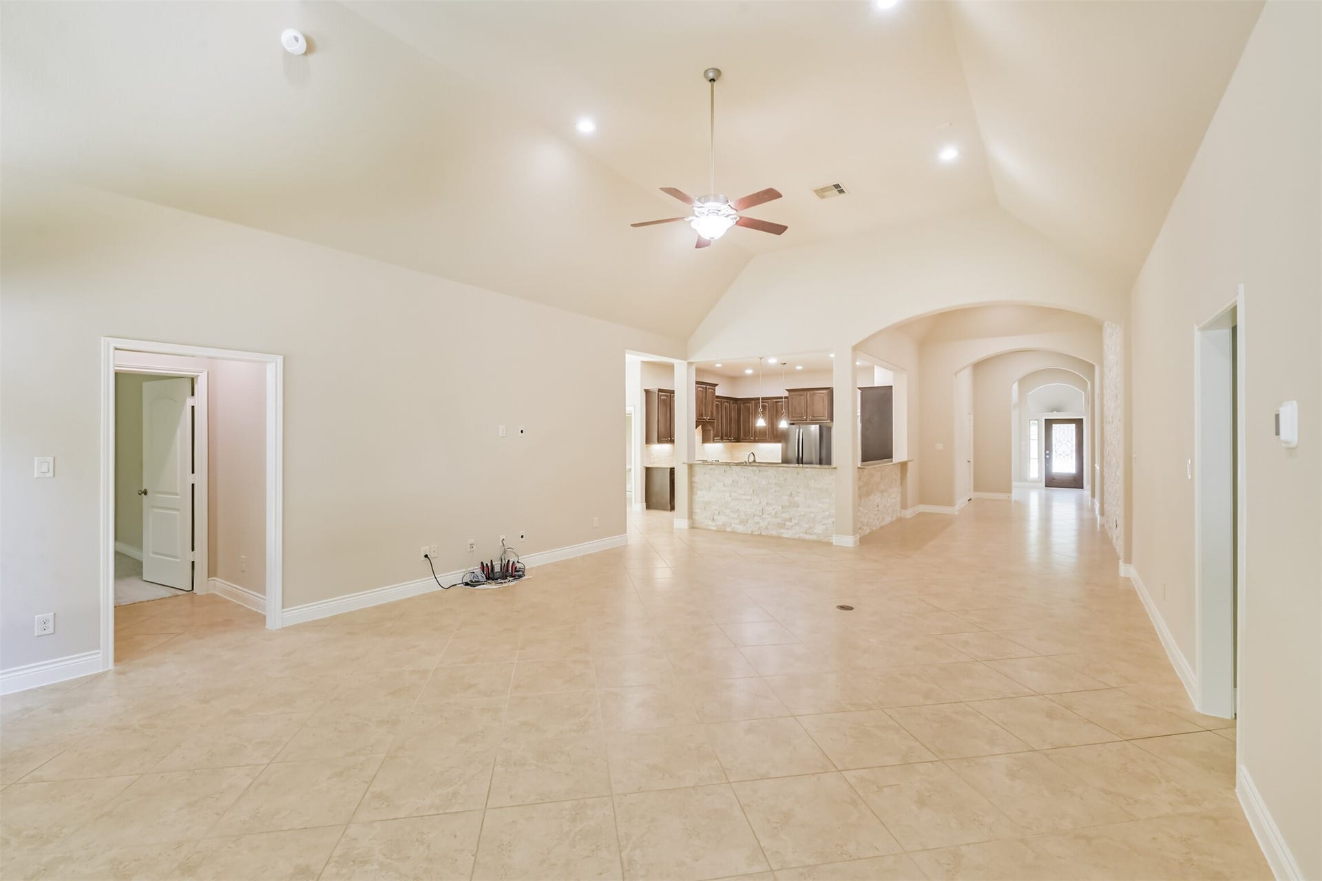 1735 Wickham Reach Drive, Spring, TX 77386 Open-concept living space with an easy connection to the kitchen and dining areas.