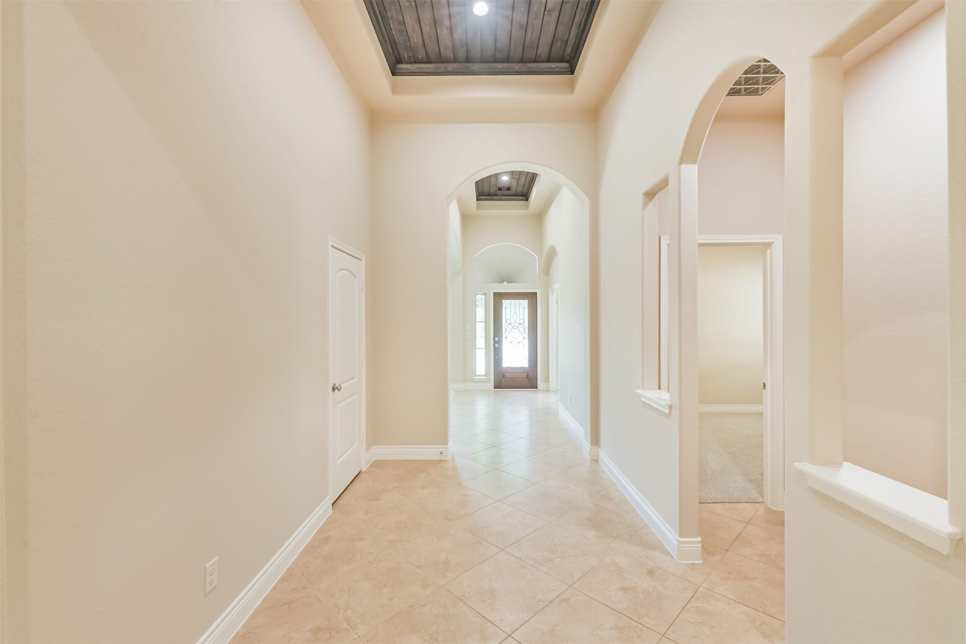 1735 Wickham Reach Drive, Spring, TX 77386 Interior hallway offering easy access to the surrounding living spaces.