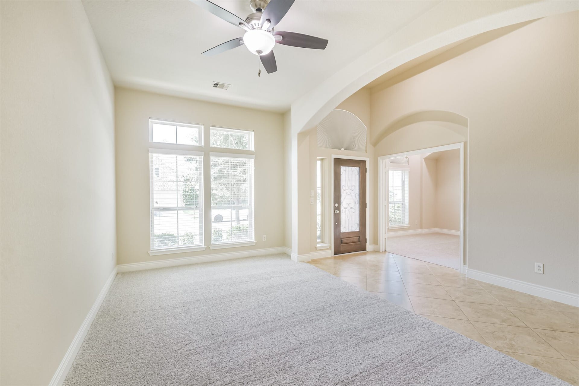 1735 Wickham Reach Drive, Spring, TX 77386 Just off the entry a space with large windows and plenty of natural light.