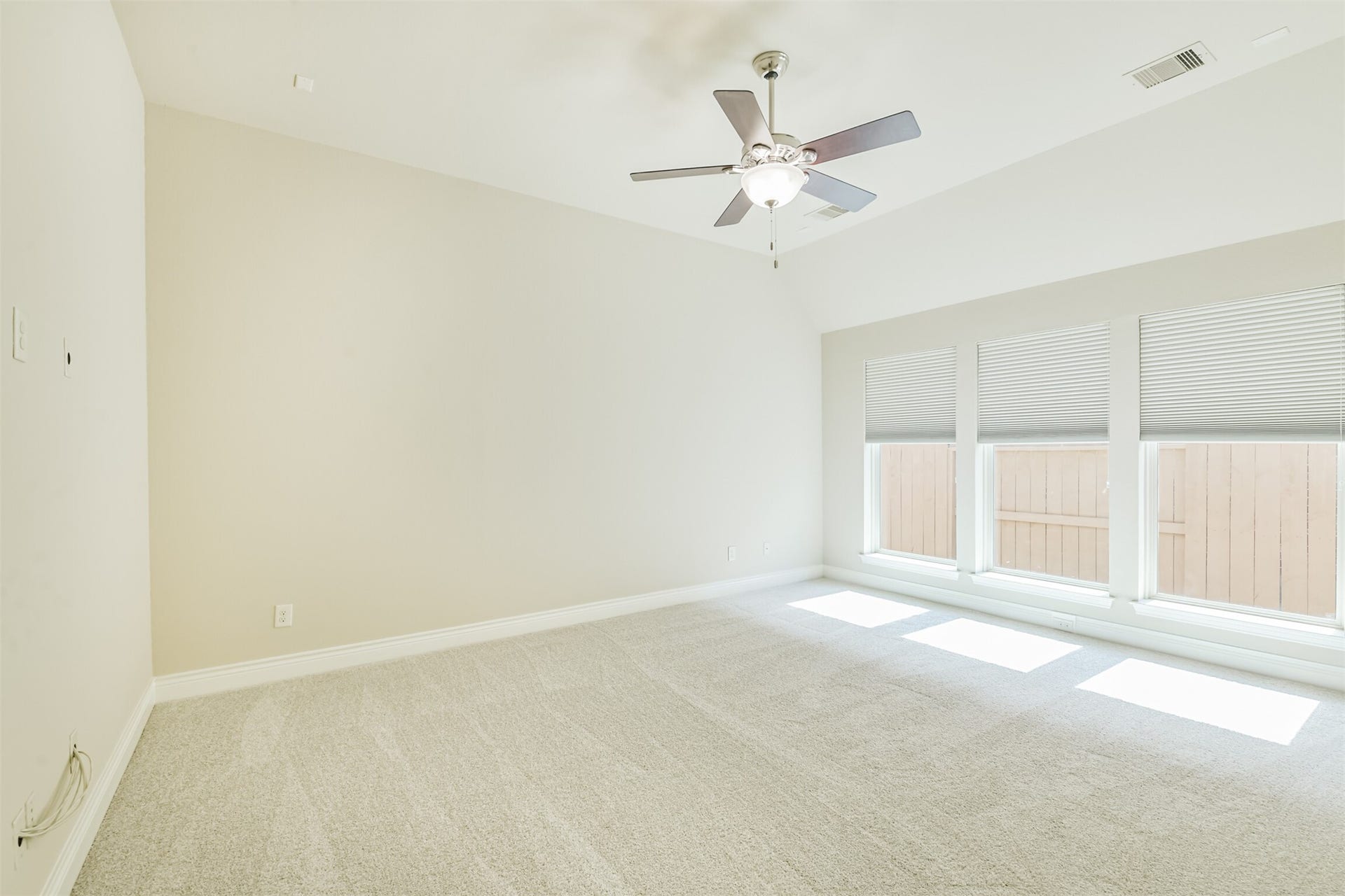 1735 Wickham Reach Drive, Spring, TX 77386 Large windows bringing in plenty of natural light.