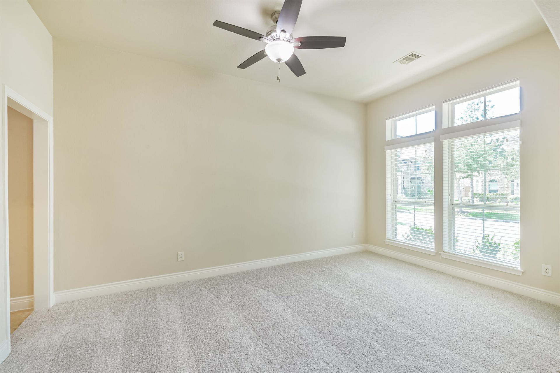 1735 Wickham Reach Drive, Spring, TX 77386 Room with high ceiling and plenty of natural light.