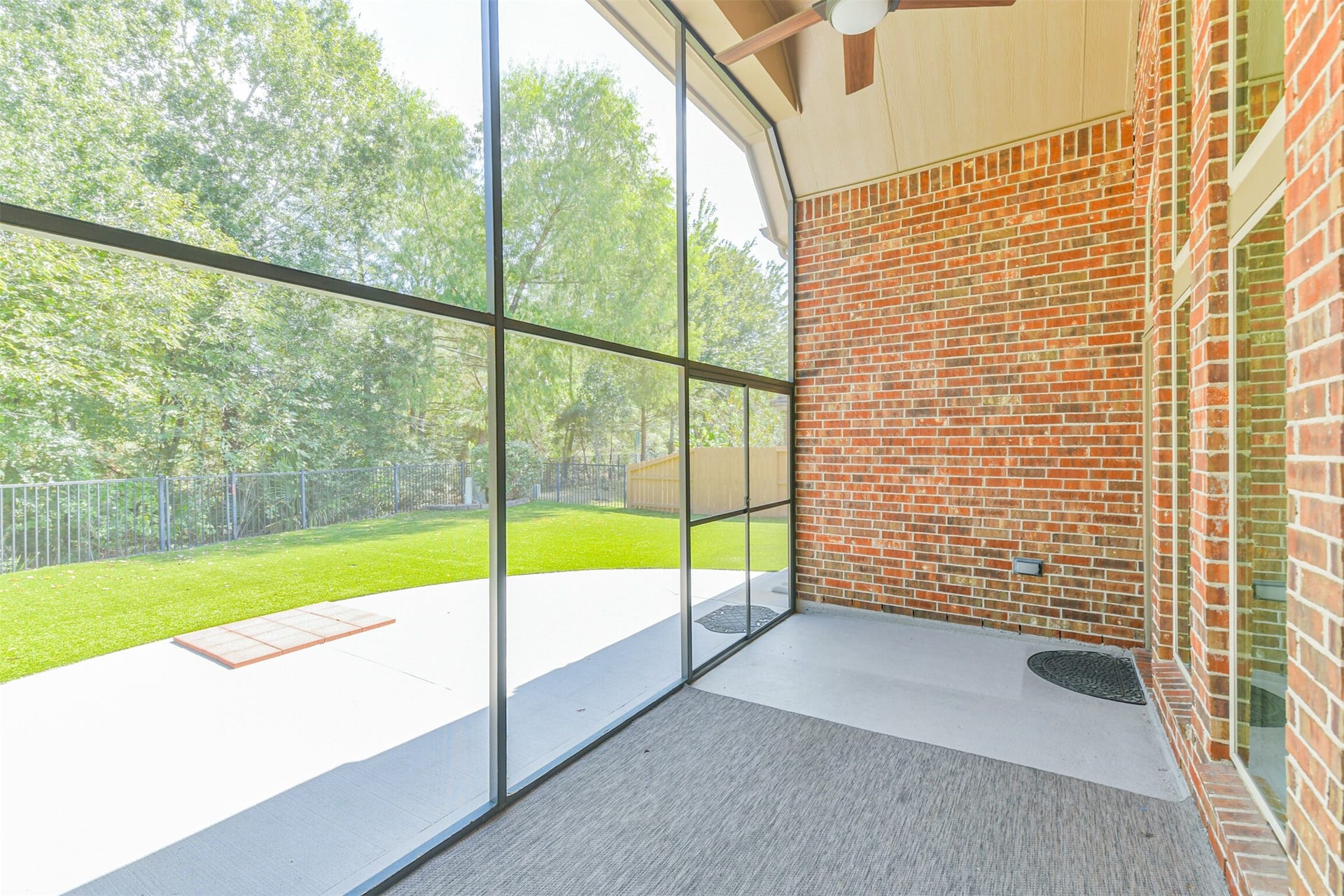 1735 Wickham Reach Drive, Spring, TX 77386 Another view of the screened patio overlooking the backyard.