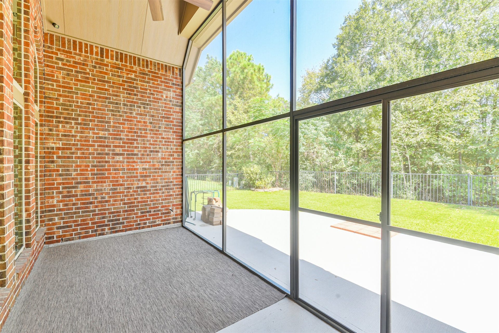 1735 Wickham Reach Drive, Spring, TX 77386 Screened-in patio offering a relaxing space to enjoy the outdoor