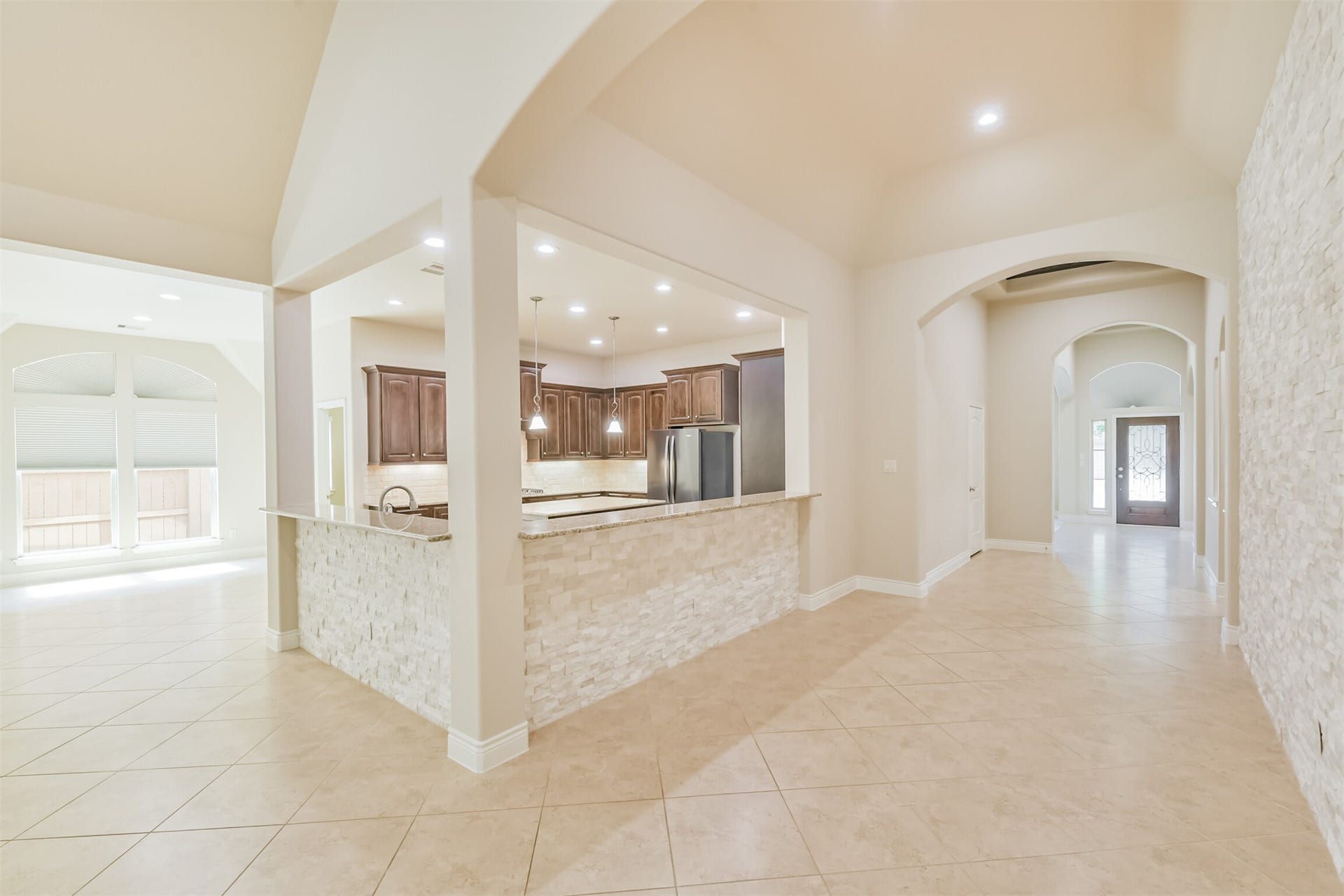 1735 Wickham Reach Drive, Spring, TX 77386 Another view highlighting the open flow between the main living spaces.