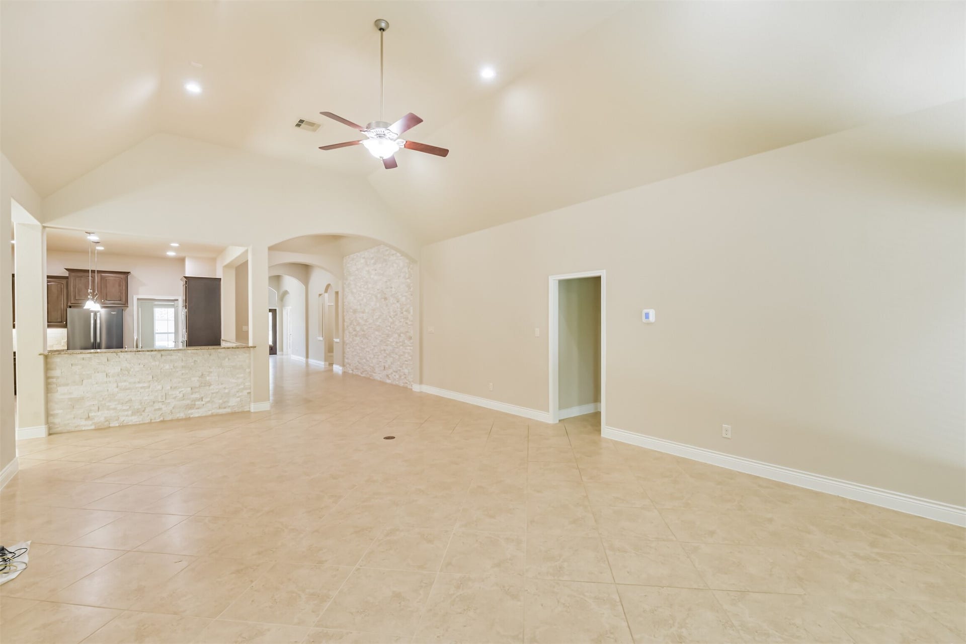 1735 Wickham Reach Drive, Spring, TX 77386 Another view of the living room showcasing the generous layout.