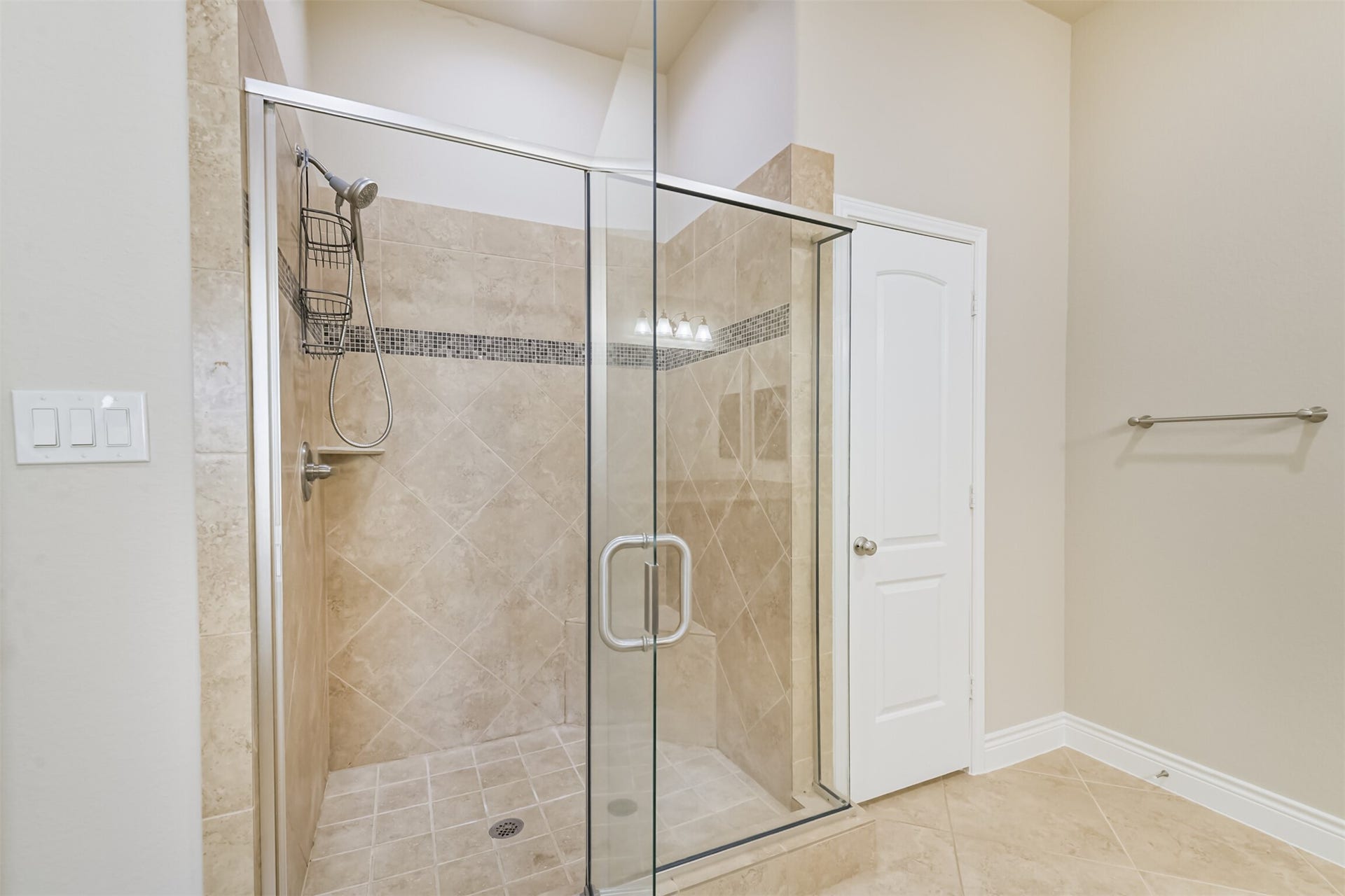 1735 Wickham Reach Drive, Spring, TX 77386 Separate glass-enclosed shower with a spacious design.