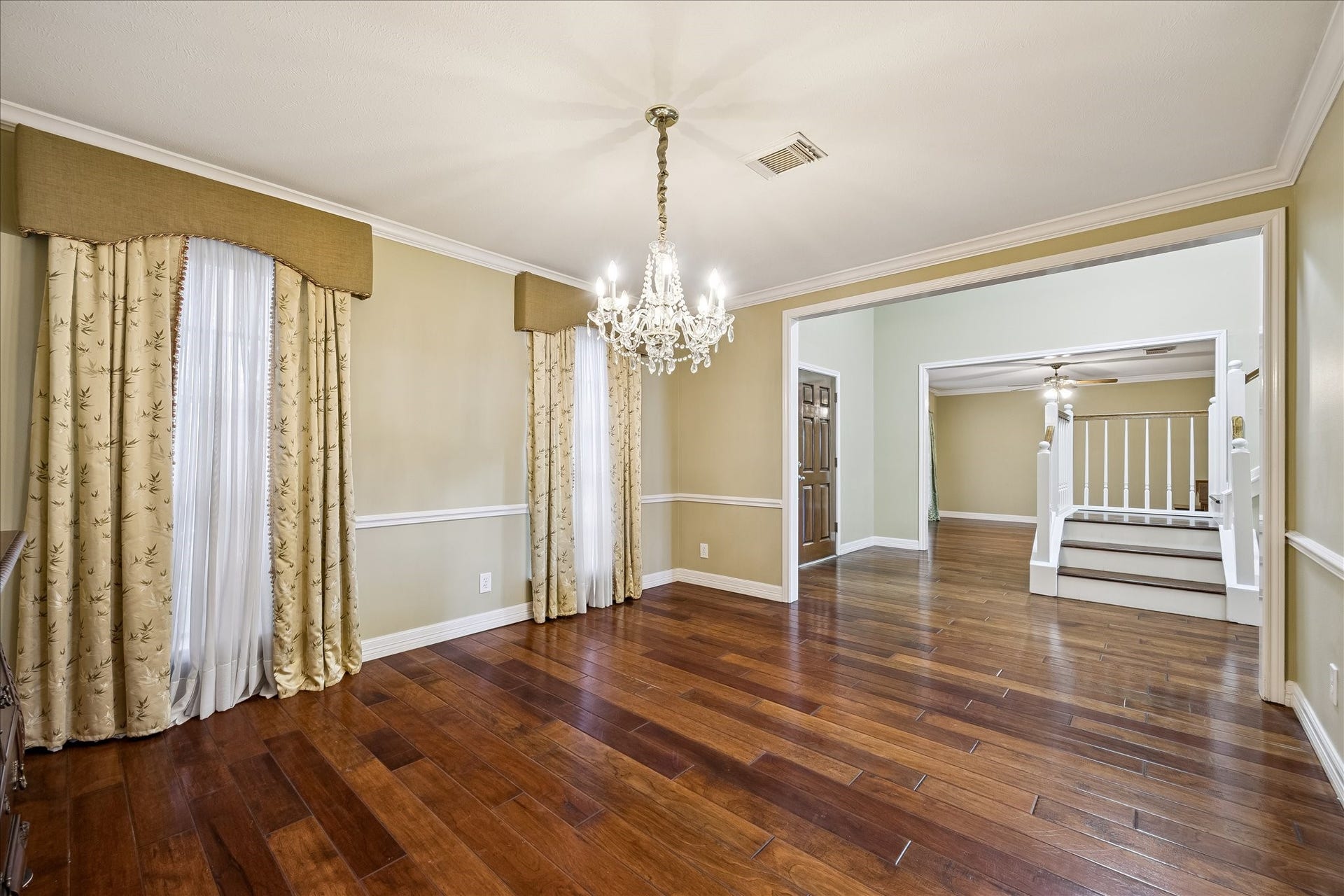 1306 Forest Hollow Drive, Missouri City, TX 77459 Just off of the entry hall to the right is a room designed to be a formal dining room. Large enough for all grand table or set it up as a work from home or gaming space. The options are endless.