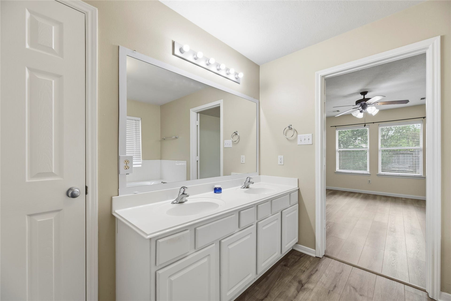 14223 Pinefrost Lane, Cypress, TX 77429 The primary bathroom includes a dual sink vanity.
