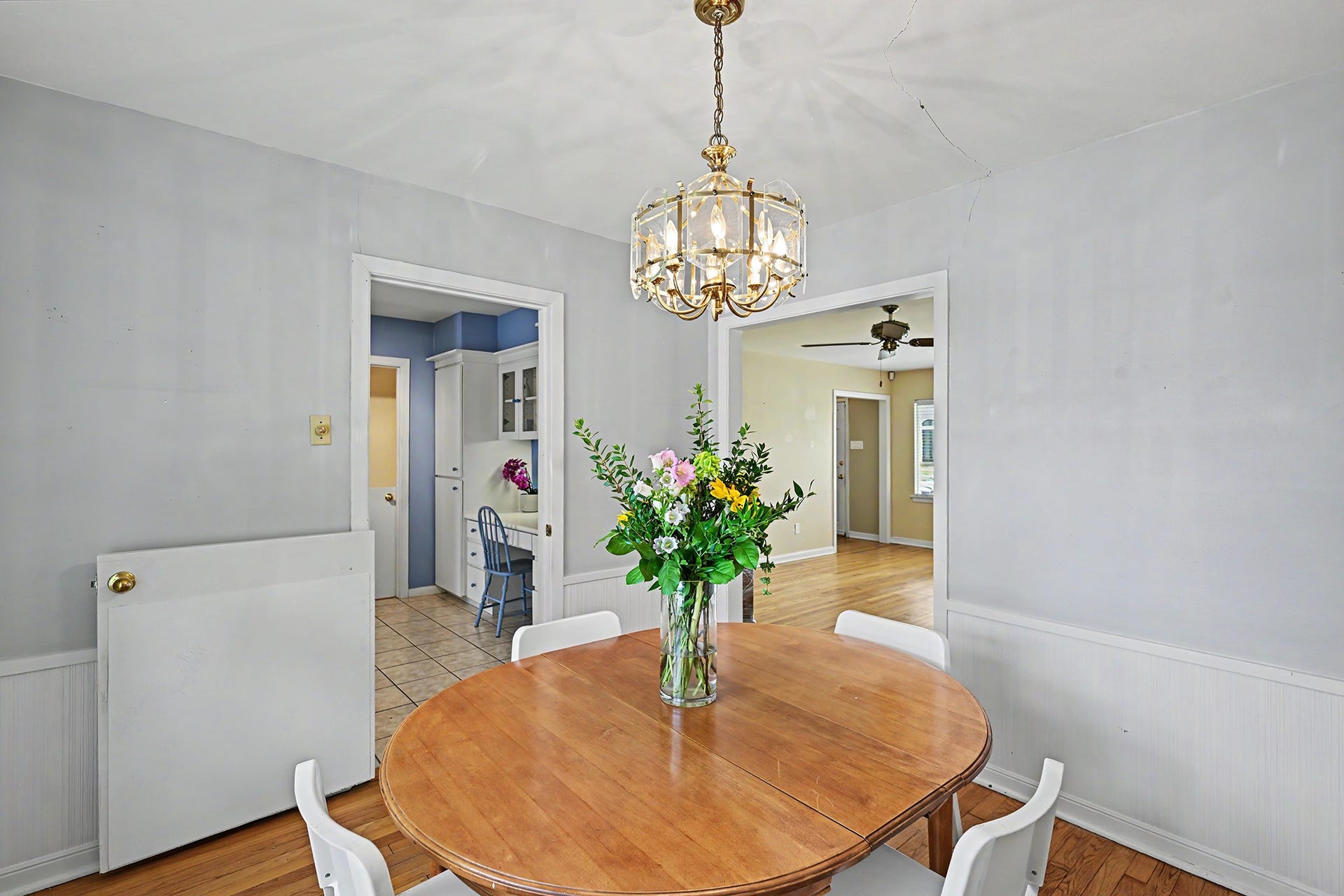 4102 Portsmouth Avenue, Houston, TX 77027 Dining room toward kitchen (with half door to contain your 4-legged friends) and living room on the right.