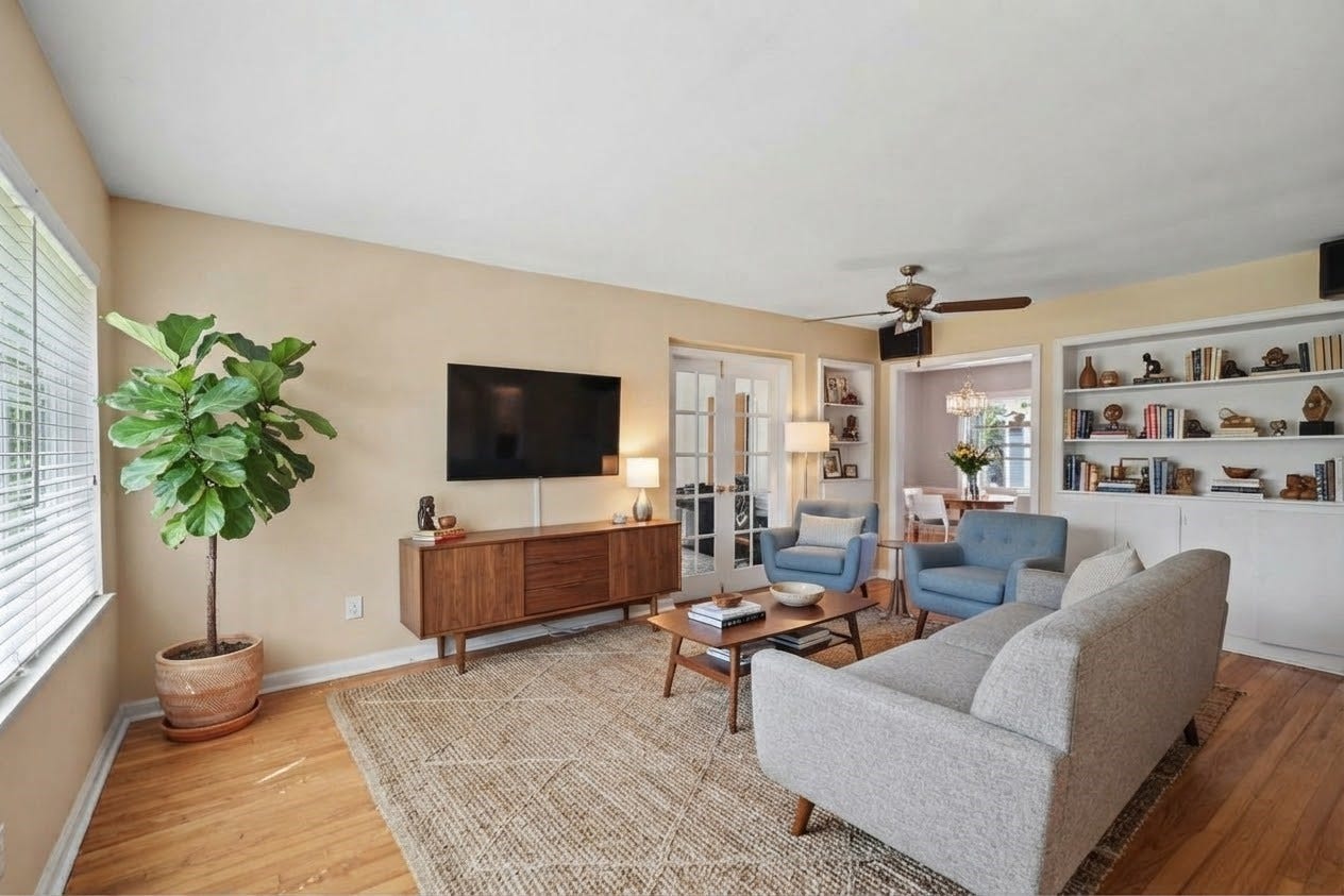 4102 Portsmouth Avenue, Houston, TX 77027 Once inside you are greeted by hardwood floors of the living room. (virtually staged)