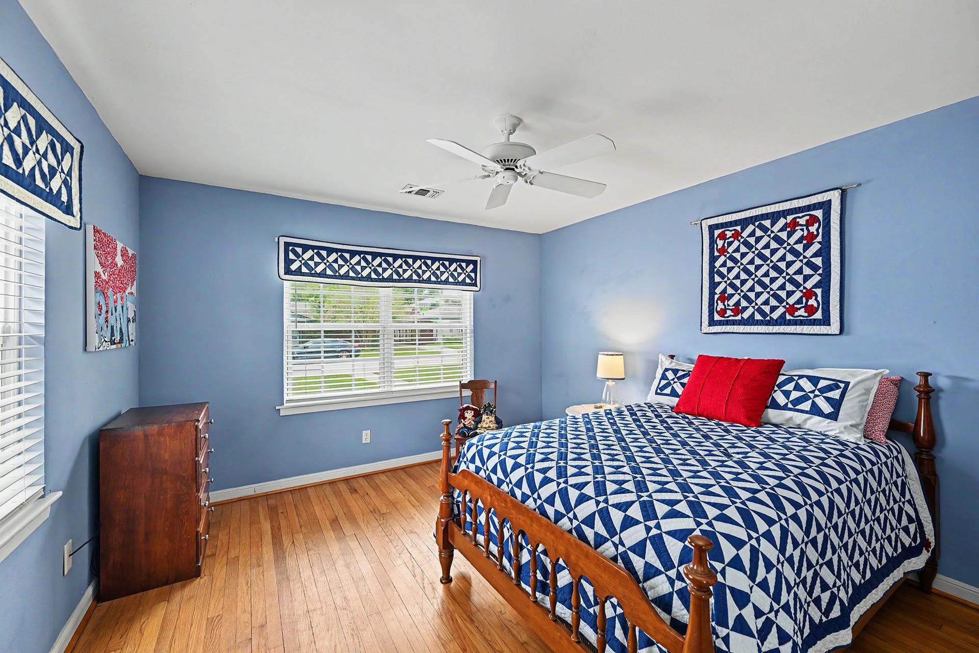 4102 Portsmouth Avenue, Houston, TX 77027 Third bedroom with all bedrooms set with a ceiling fan and window treatments. (virtually staged)