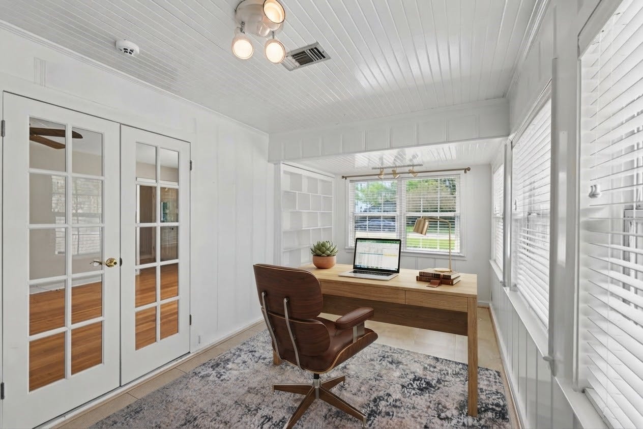 4102 Portsmouth Avenue, Houston, TX 77027 French doors from the living room open up to the home office with built-ins and nice natural light. (virtually staged)