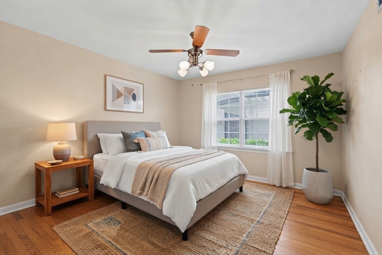 4102 Portsmouth Avenue, Houston, TX 77027 Third bedroom with all bedrooms set with a ceiling fan and window treatments. (virtually staged)