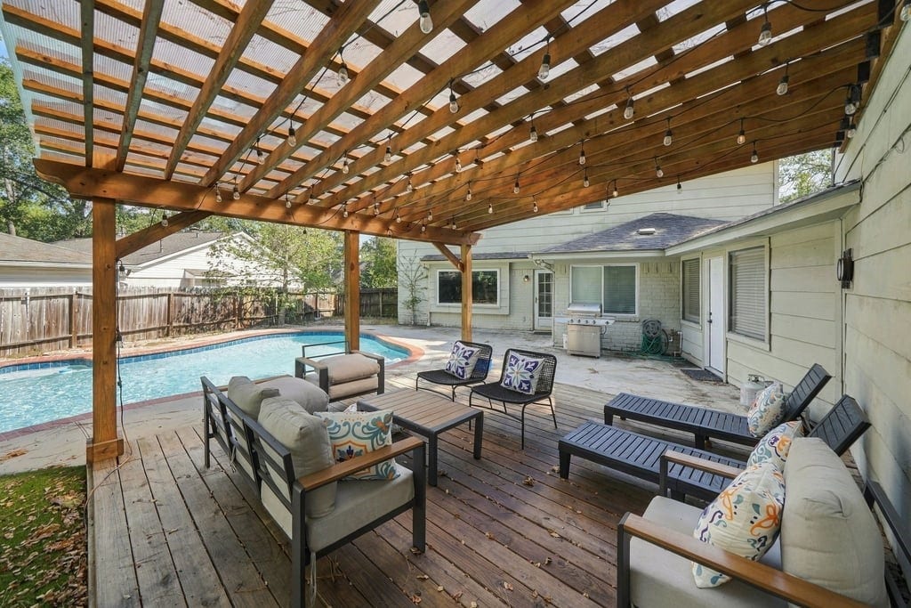 27209 Wells Lane, Conroe, TX 77385 backyard with a pool and gazebo
