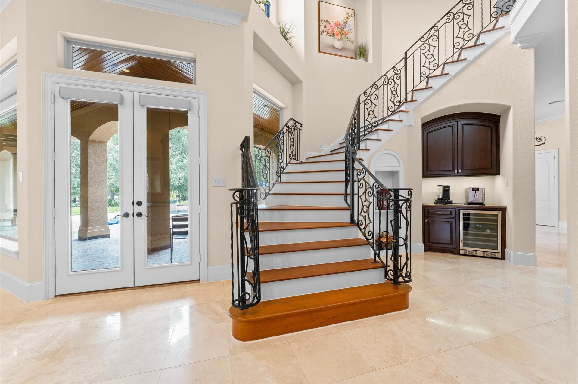 28427 Woodsons Lake Drive, Spring, TX 77386 Grand staircase with beautiful wrought iron.