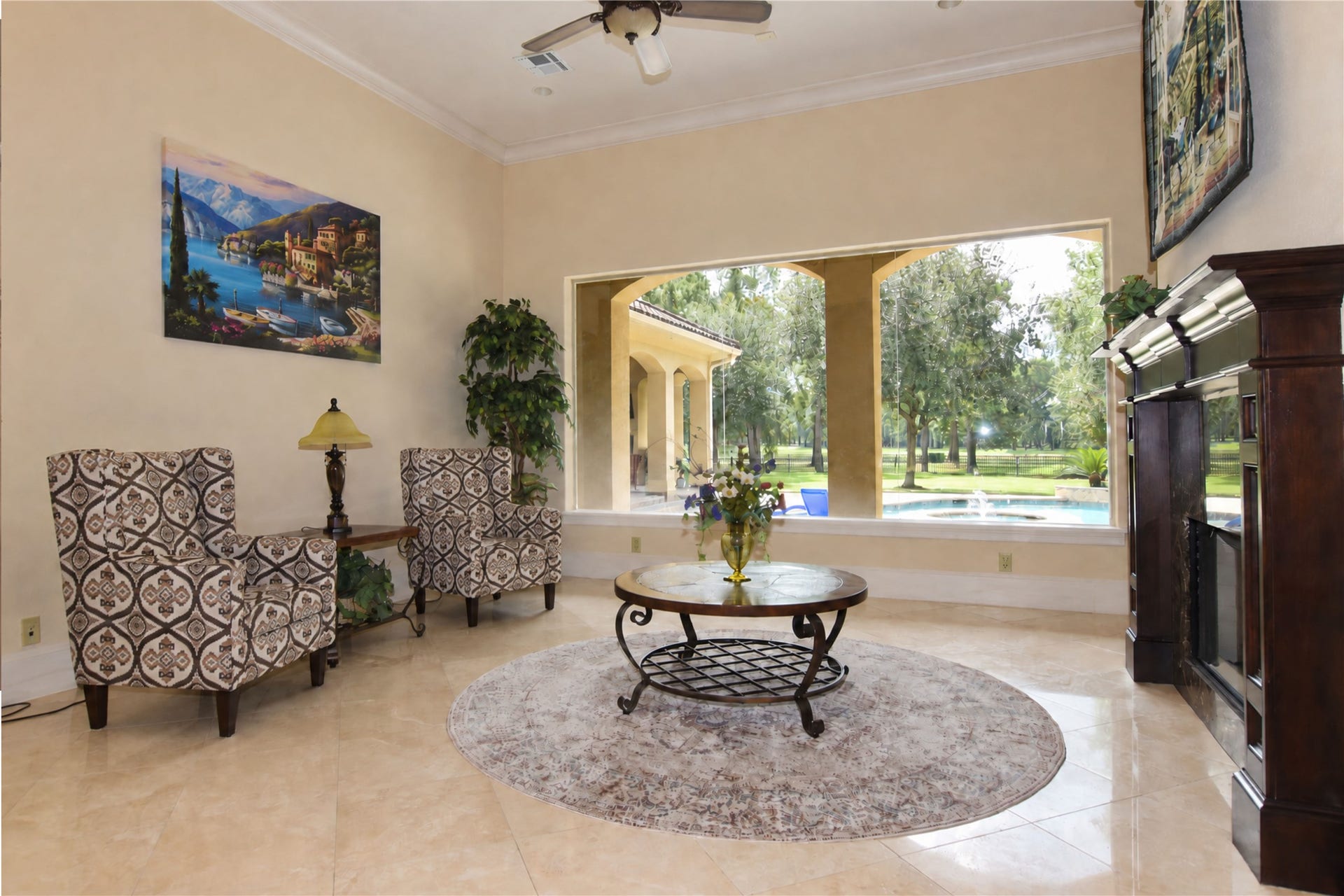 28427 Woodsons Lake Drive, Spring, TX 77386 Sitting area overlooking the swimming pool and the lake.