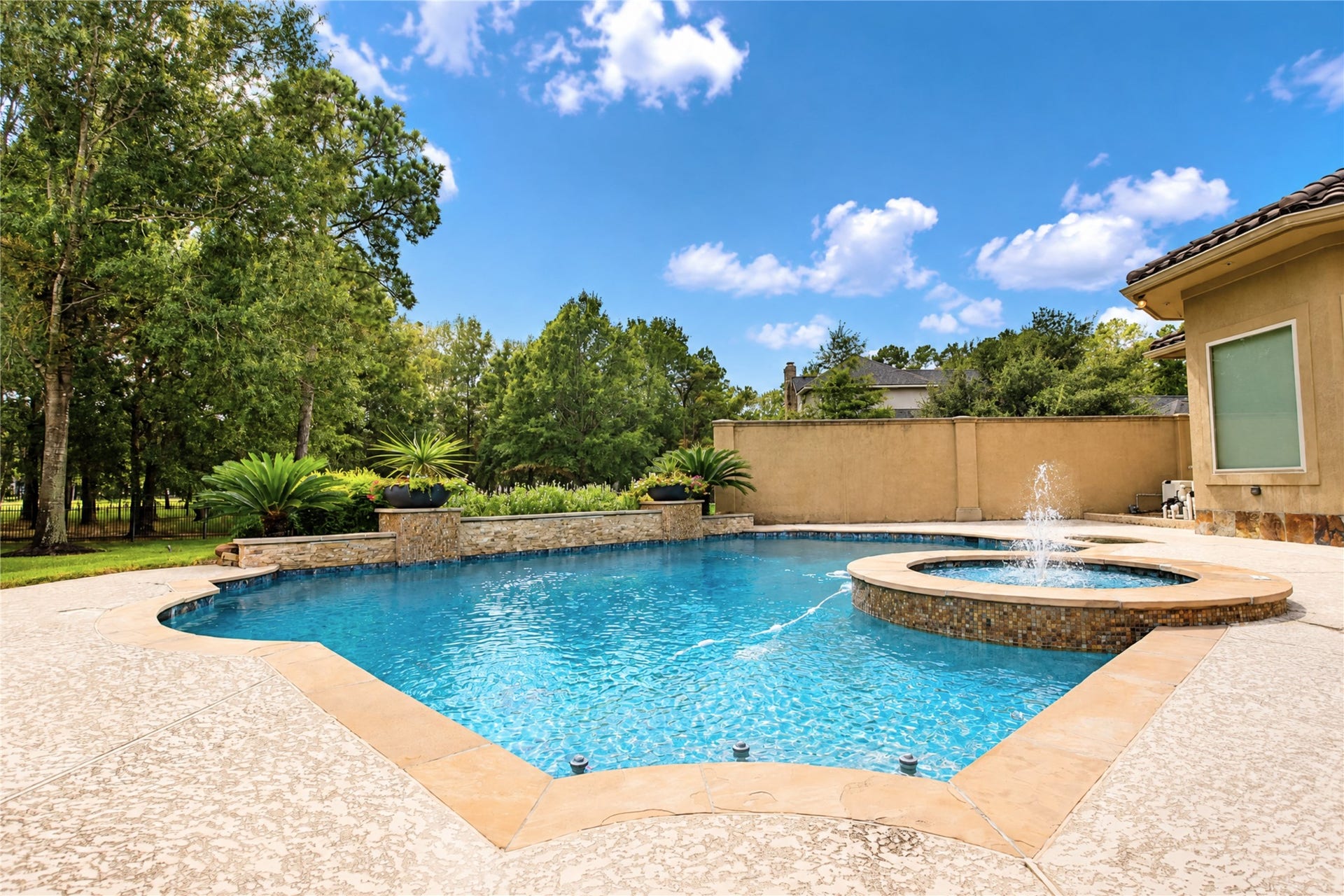 28427 Woodsons Lake Drive, Spring, TX 77386 Recently resurfaced by StoneScapes and comes with a warranty.