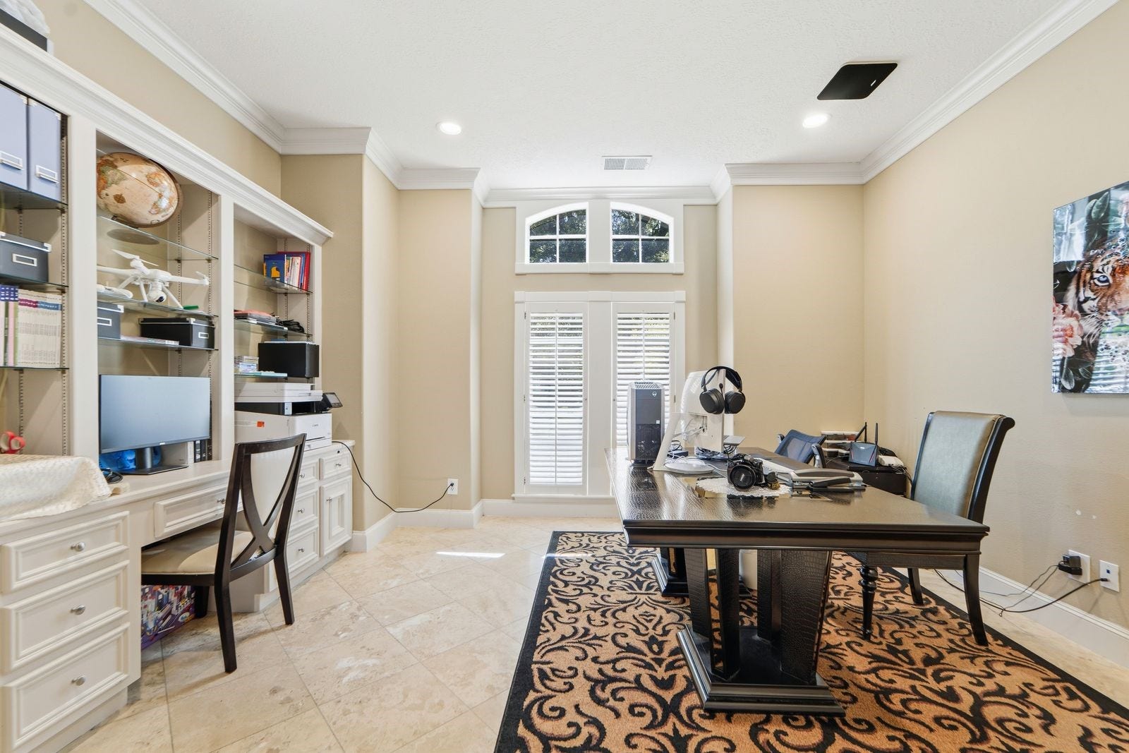 1606 Clearwater Creek Drive, Sugar Land, TX 77478 Plenty of storage in this functional workspace. French doors for privacy.