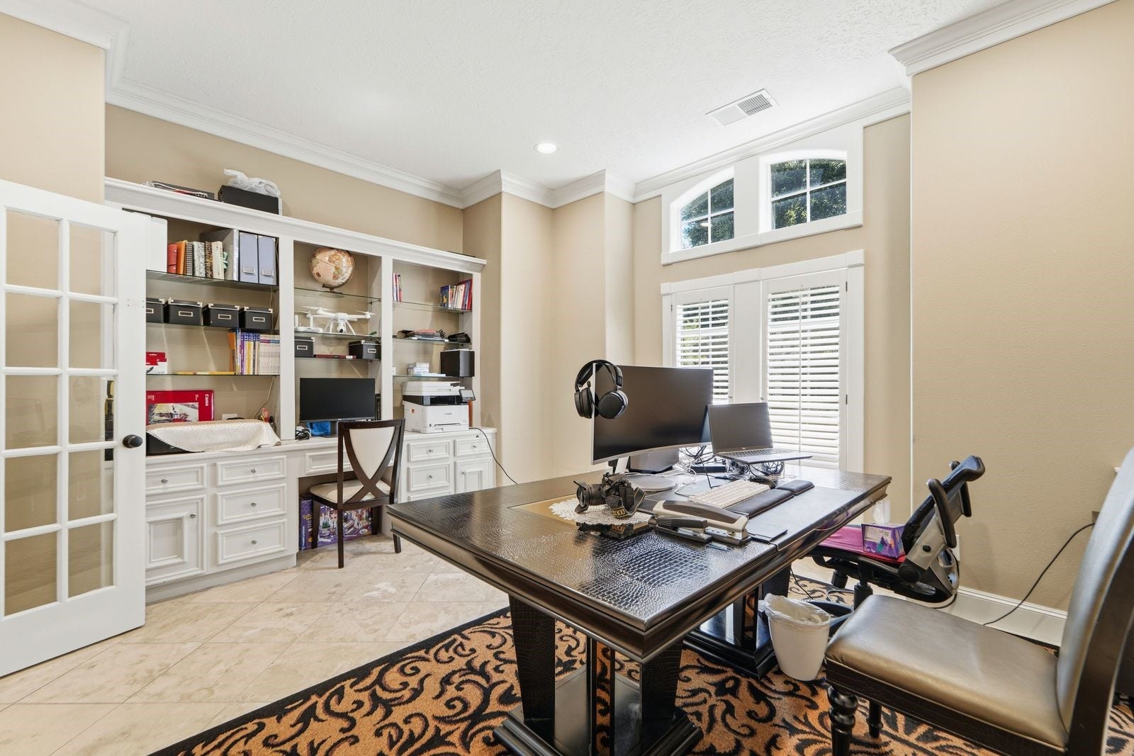 1606 Clearwater Creek Drive, Sugar Land, TX 77478 The home office is large enough for several work stations
