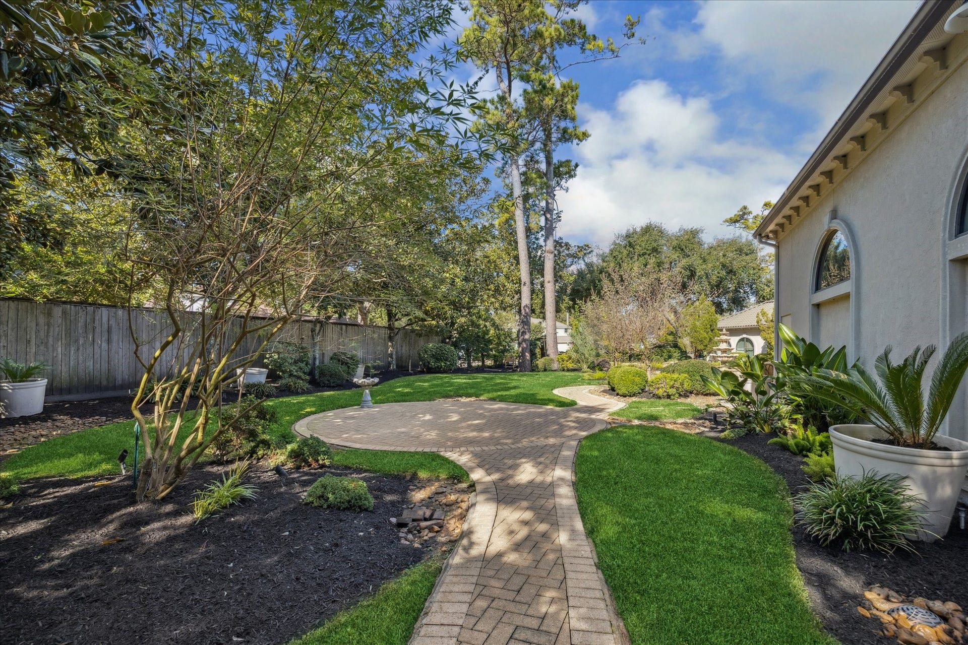 11722 Claywood Street, Houston, TX 77024 Side Yard and Pathways