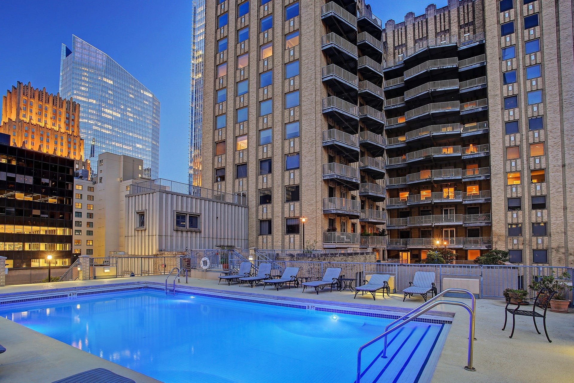 914 Main Street, #801, Houston, TX 77002 Enjoy the city skyline views from this stunning rooftop pool area, perfect for relaxing or entertaining.