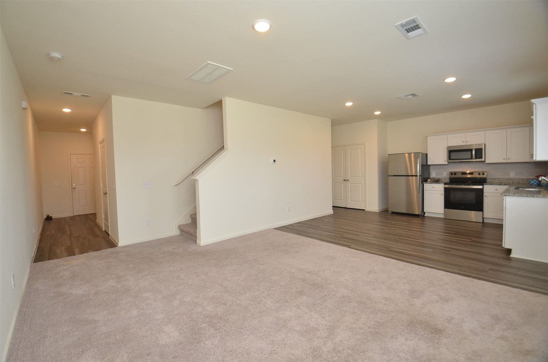8627 Vacek Crossing Way, Richmond, TX 77469 Wide angle Family room, Dining, Kitchen