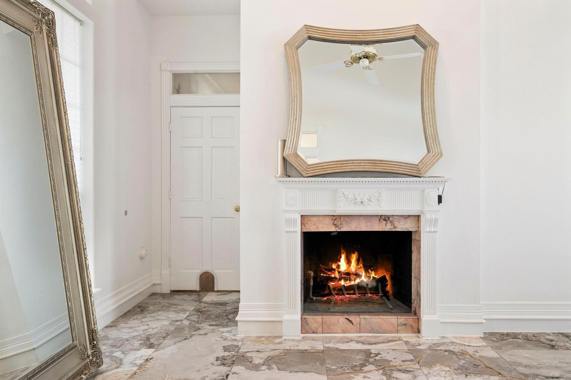 2922 Cedar Woods Place, Houston, TX 77068 The Primary Bedroom features its own beautiful fireplace, adding warmth, charm, and a true sense of luxury to this serene retreat.