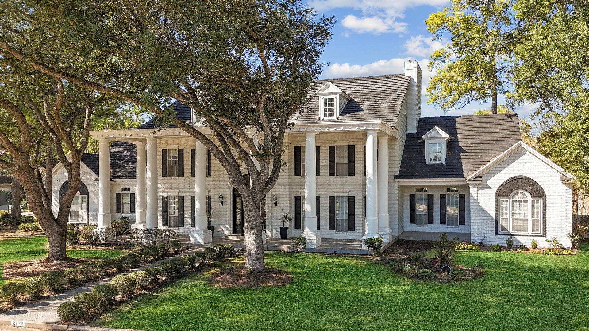 2922 Cedar Woods Place, Houston, TX 77068 with columnsaccenting the expansive frontporch