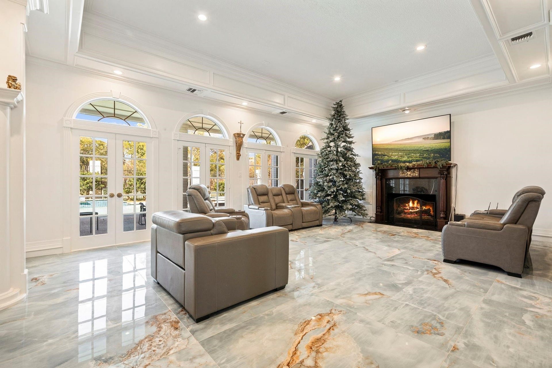 2922 Cedar Woods Place, Houston, TX 77068 Natural light cascades into the Living Room through a beautiful series of French doors that open to the backyard retreat beyond.