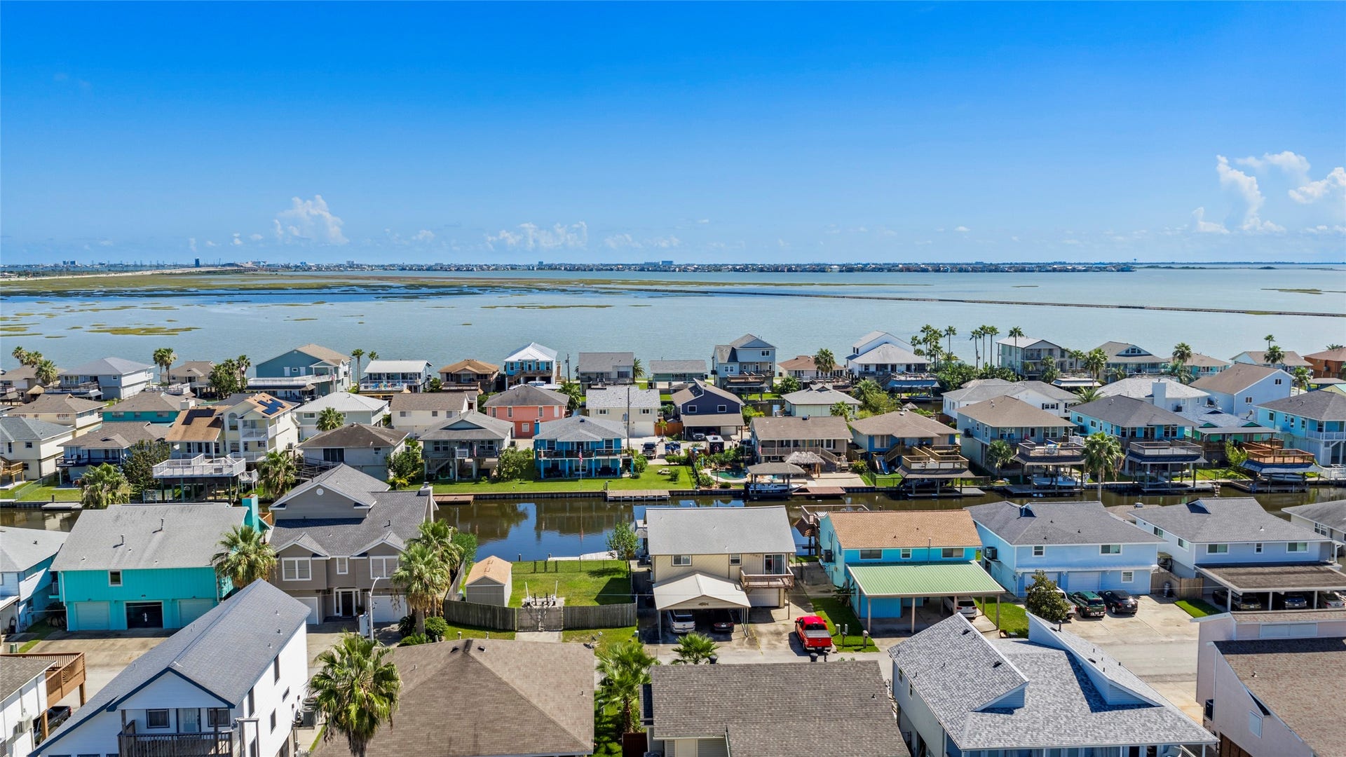 1097 Redfish Street, Bayou Vista, TX 77563 Enjoy the coastal life in your new waterfront home in Bayou Vista