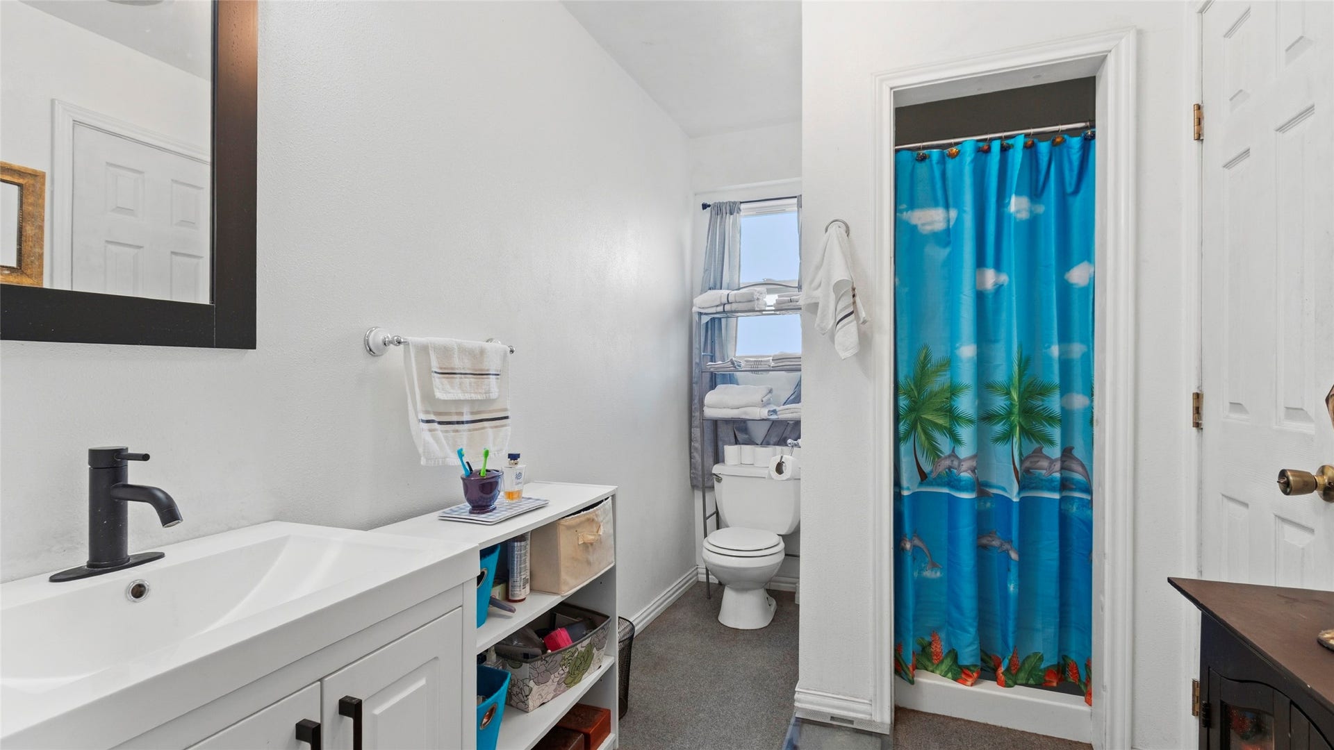 1097 Redfish Street, Bayou Vista, TX 77563 Downstairs boasts a large flexible ground-level suite complete with its own private bath and private entranceideal as a 3rd bedroom, guest quarters, or home office.