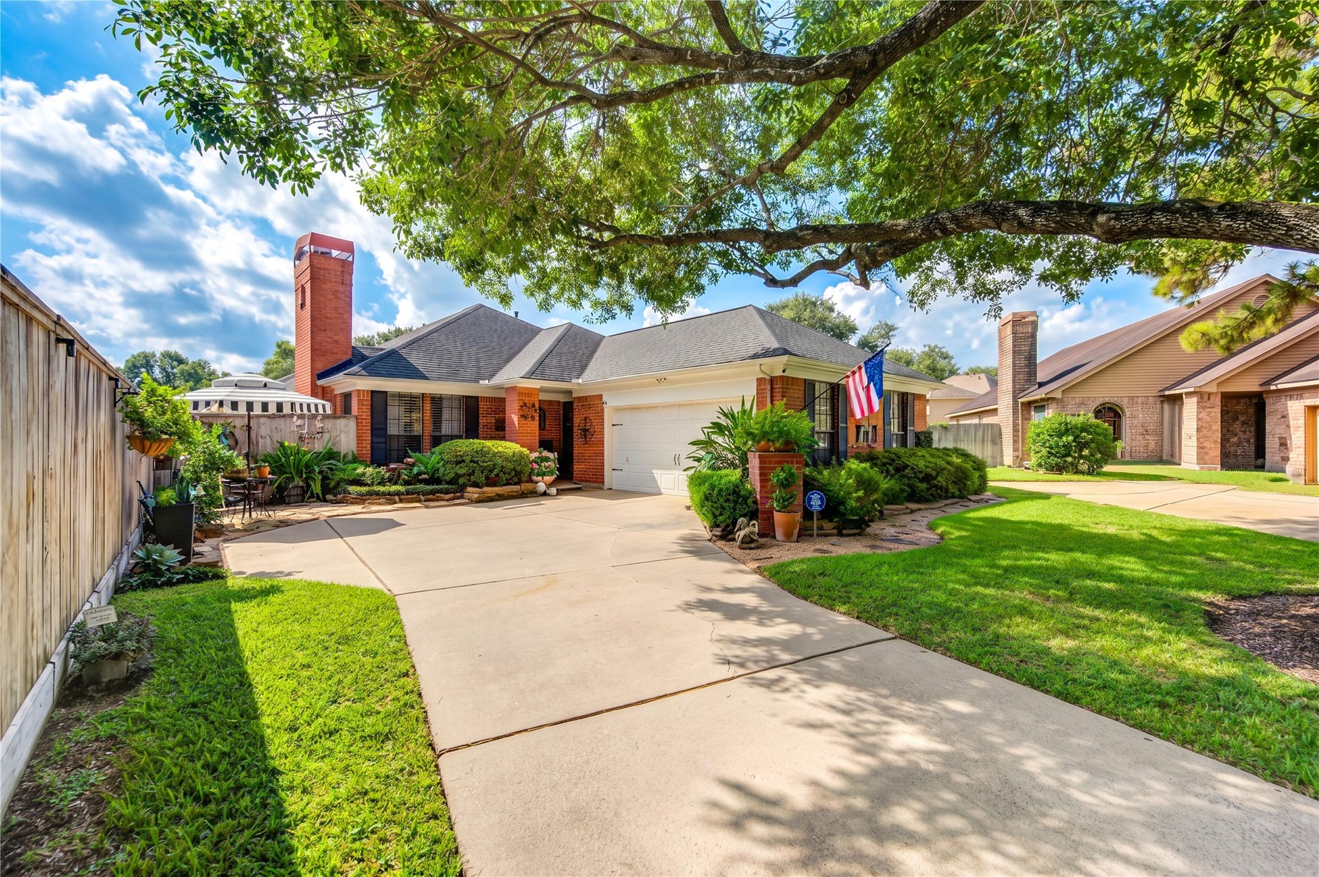 6839 Hertford Park Drive, Houston, TX 77084 Mature trees, manicured landscaping and a spacious driveway create a welcoming first impression.