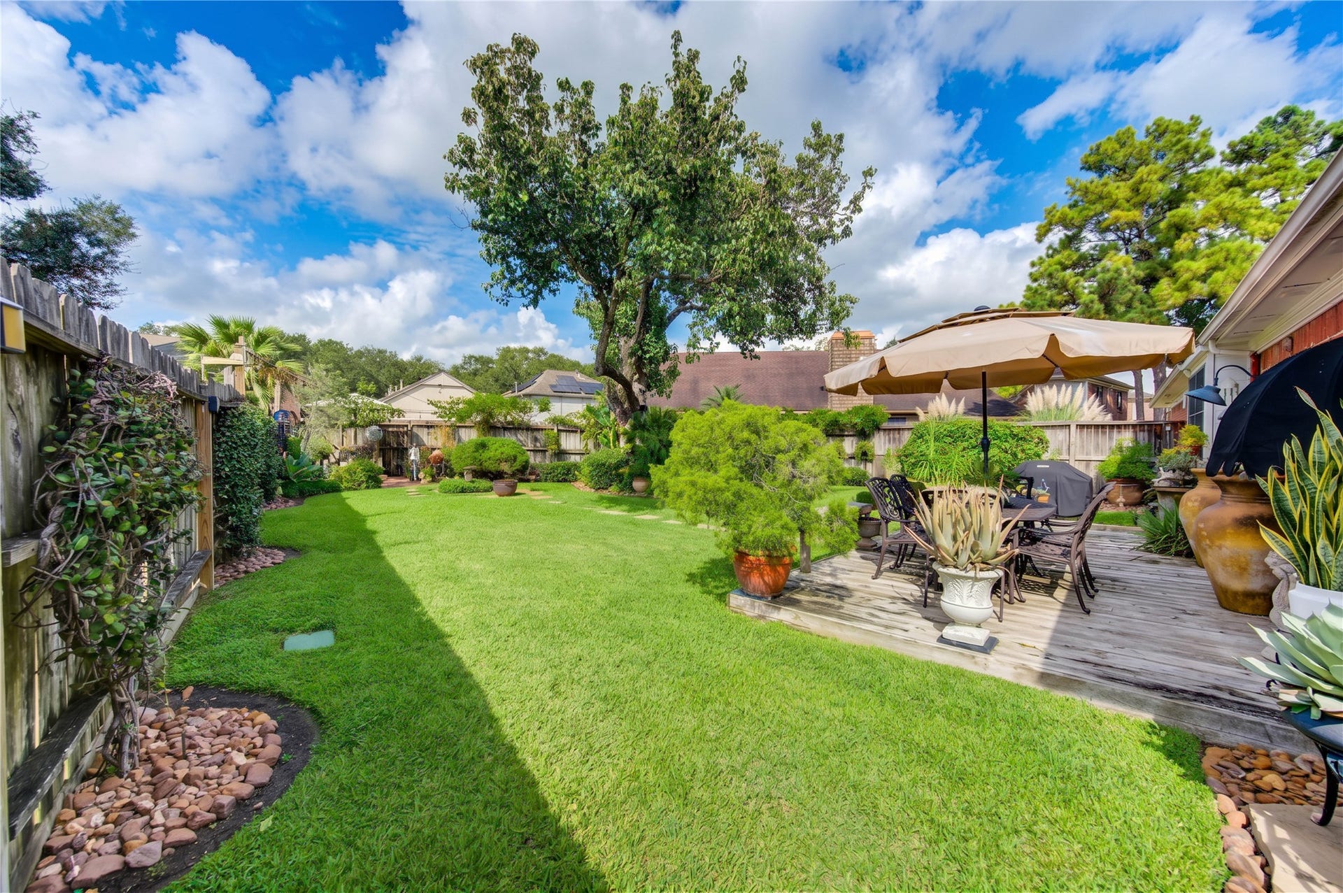 6839 Hertford Park Drive, Houston, TX 77084 A manicured lawn and landscaped borders reflect the homeowners pride and care.