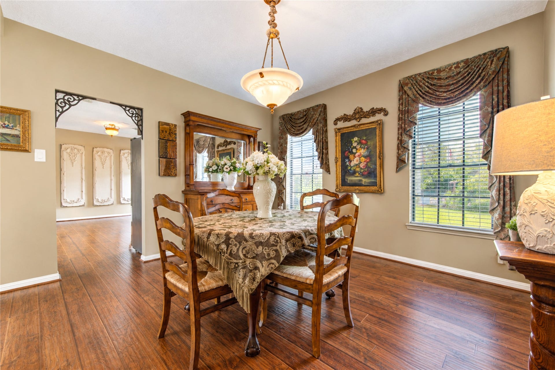 6839 Hertford Park Drive, Houston, TX 77084 Large windows bring natural light into the dining room, conveniently located beside the kitchen.