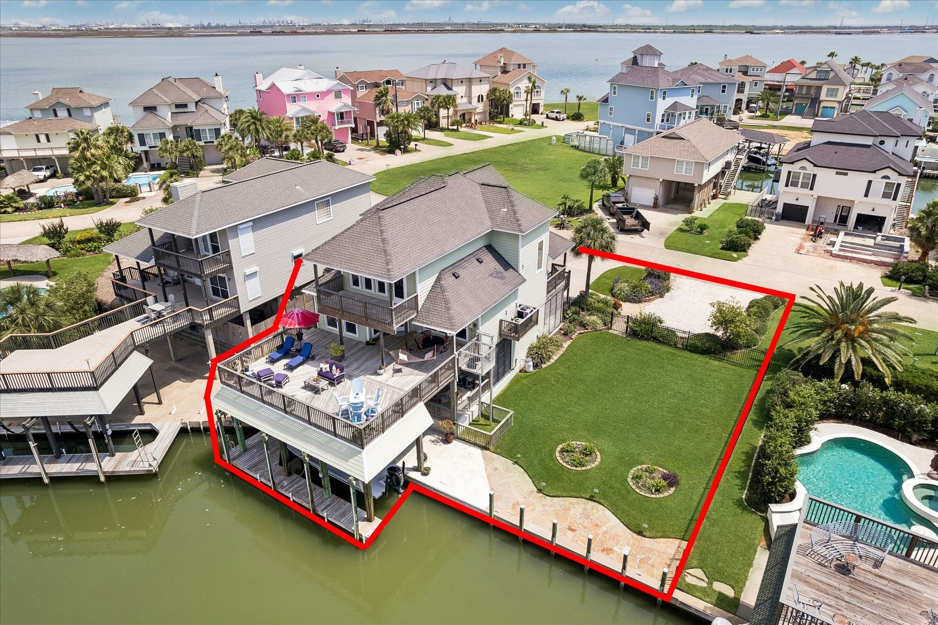 515 Westerly Drive, Tiki Island, TX 77554 Extra land and home from above.