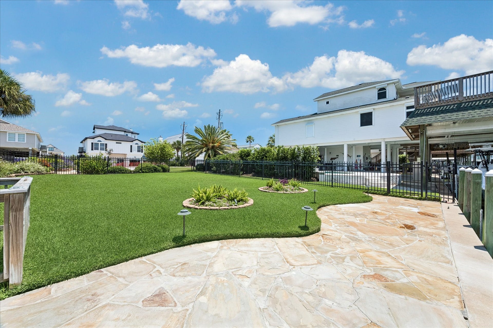 515 Westerly Drive, Tiki Island, TX 77554 Additional lot space enough room for expansion and a pool.