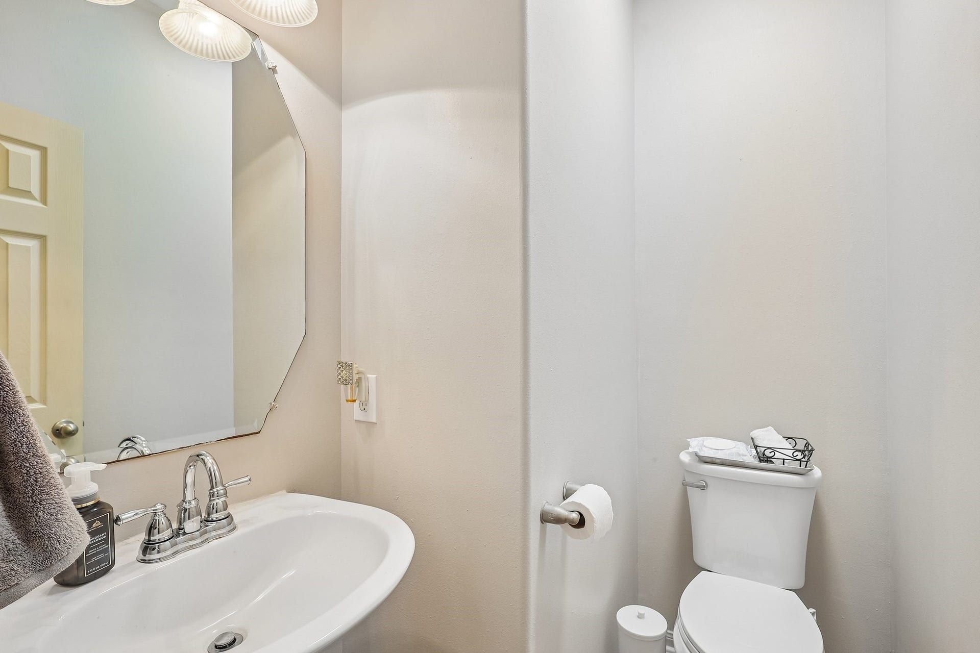 4731 Maple Creek Drive, Fresno, TX 77545 A tucked away powder bath that keeps guests comfortable