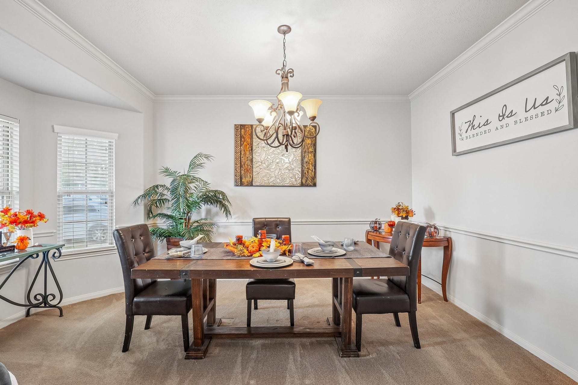 4731 Maple Creek Drive, Fresno, TX 77545 Formal dining with a bay window, crown molding, and chair rail